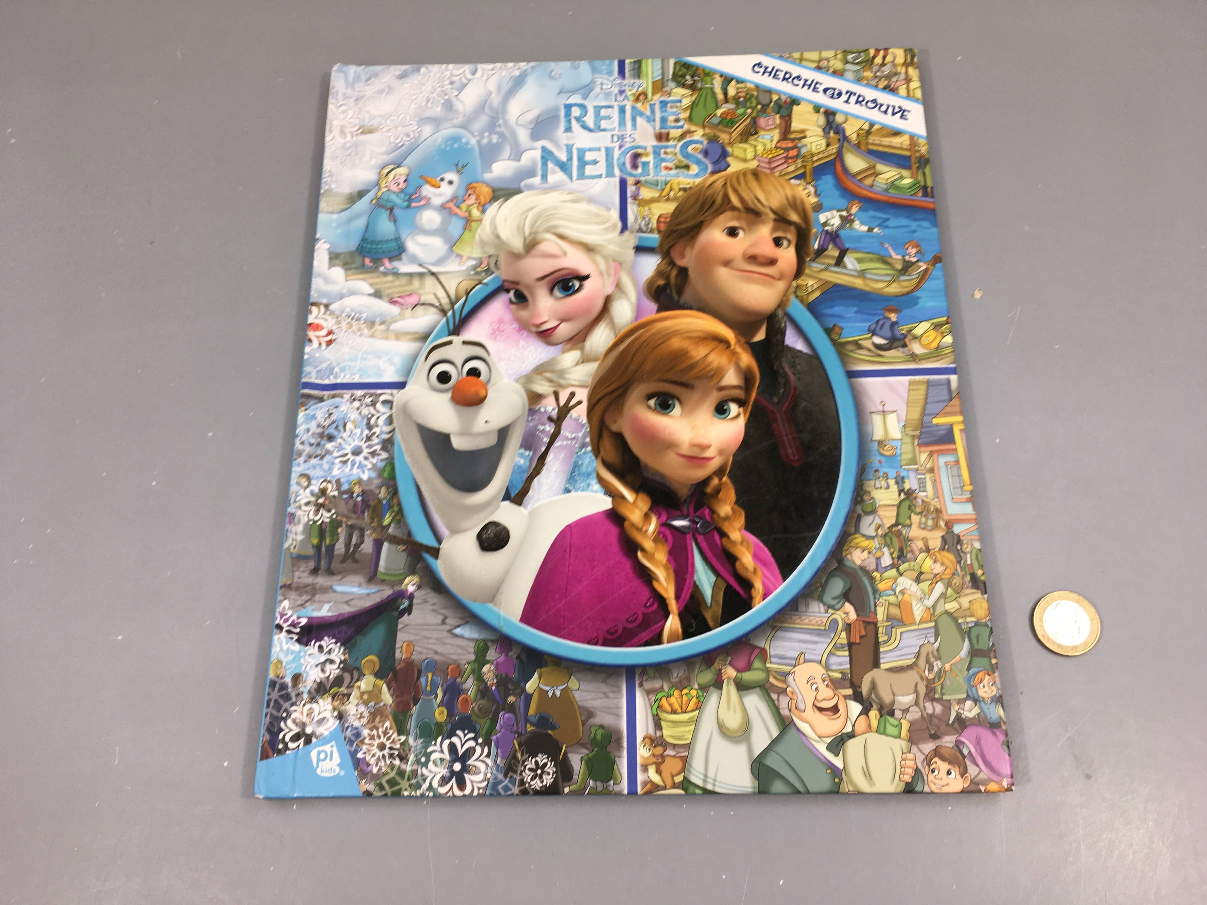 Cherche et trouve La reine des Neiges 1ere page un peu déchirée haut