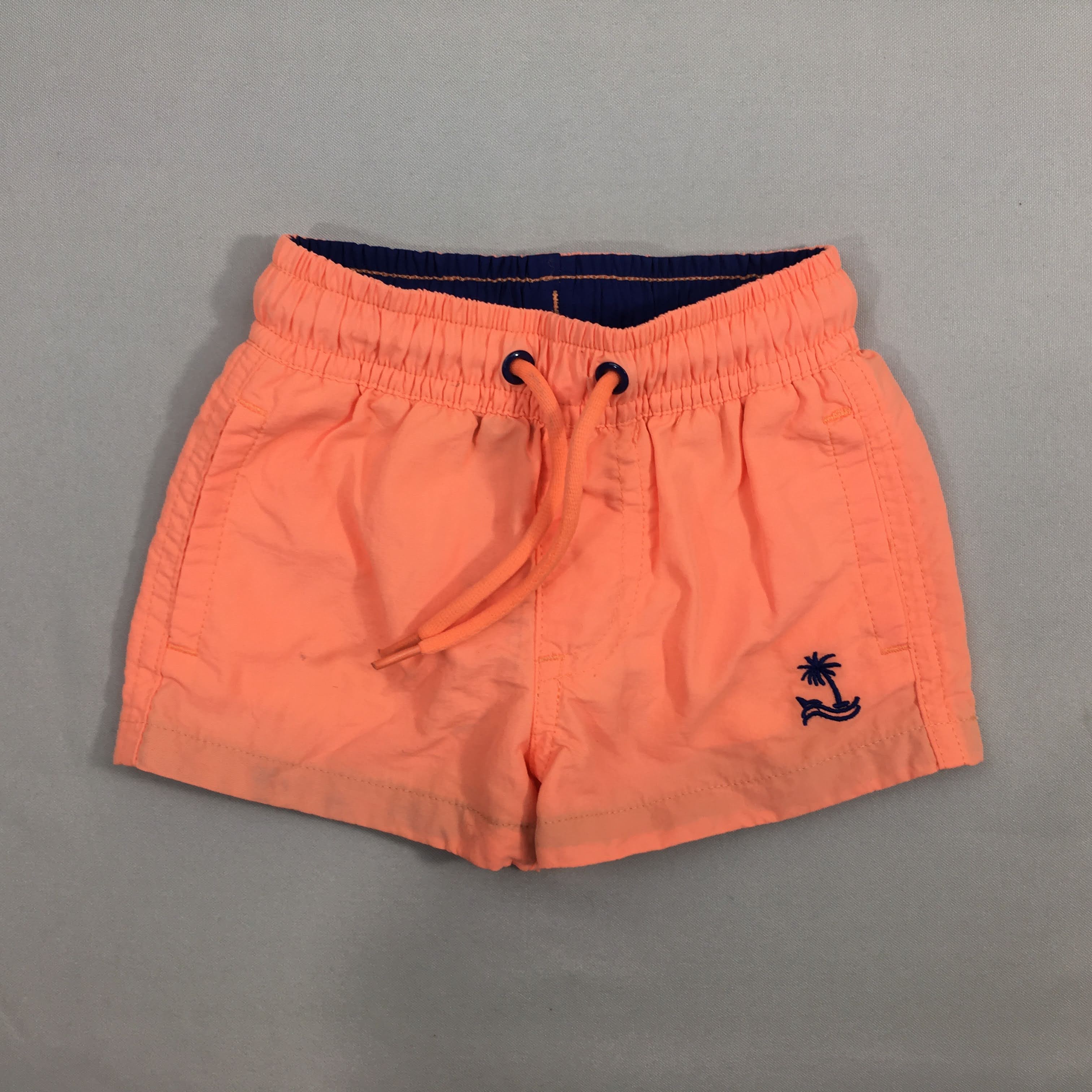 Maillot short orange néon