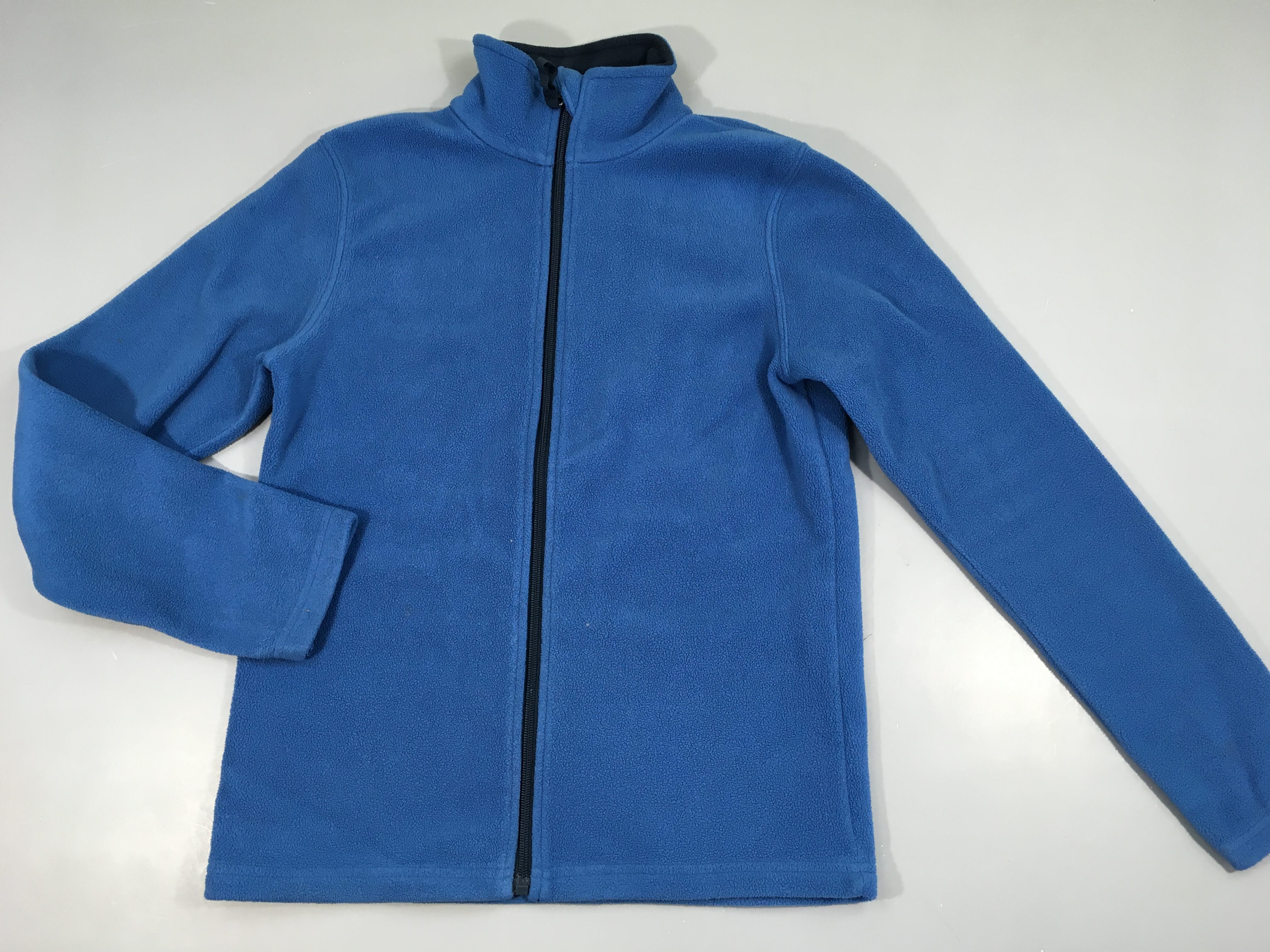 Polar zippé bleu-Petite tache arrière manche G