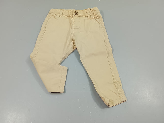 Pantalon beige, légère tache blanche à la jambe gauche, moins cher chez Petit Kiwi