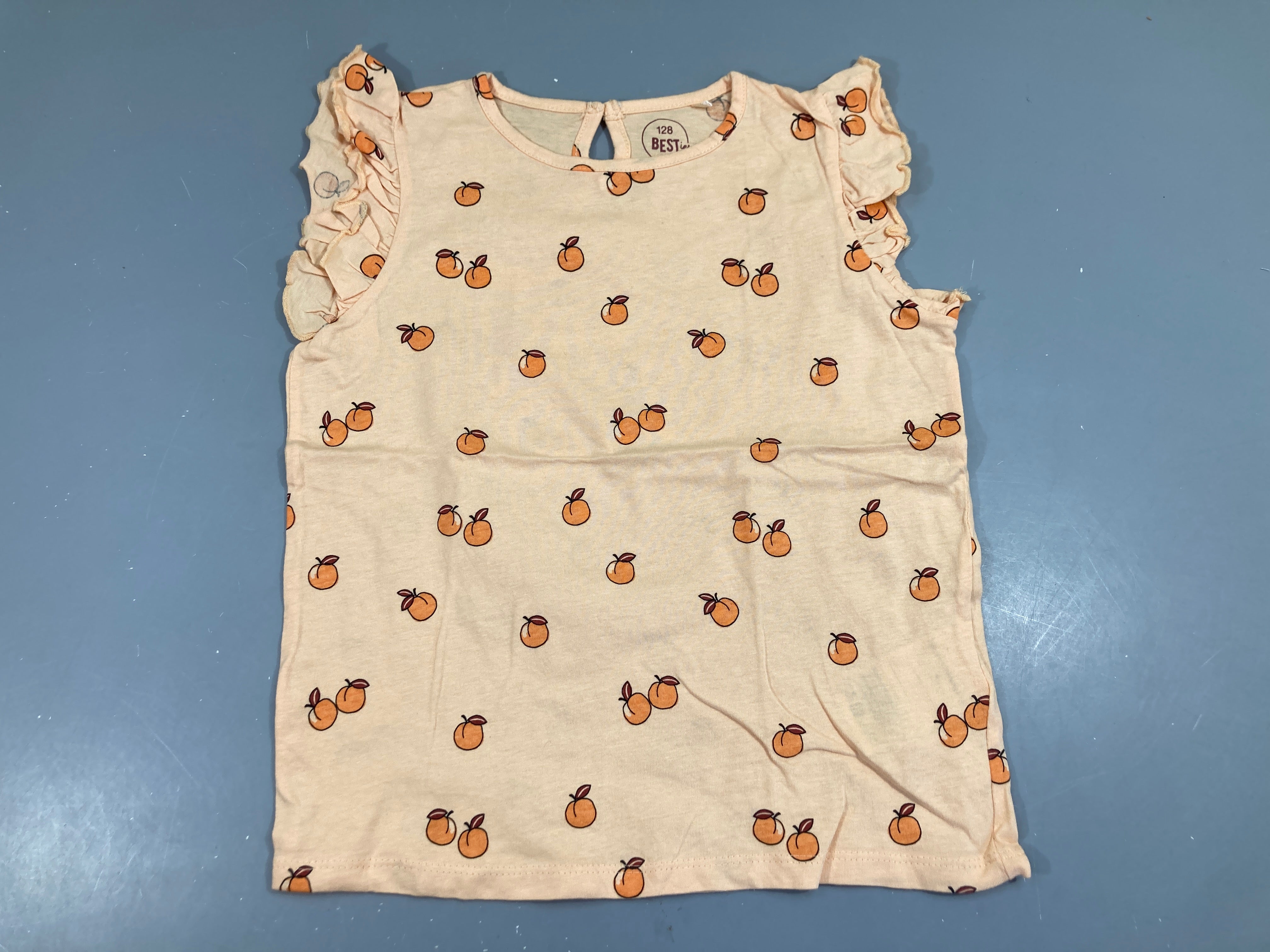 T-shirt m.c volants orange pâle abricots