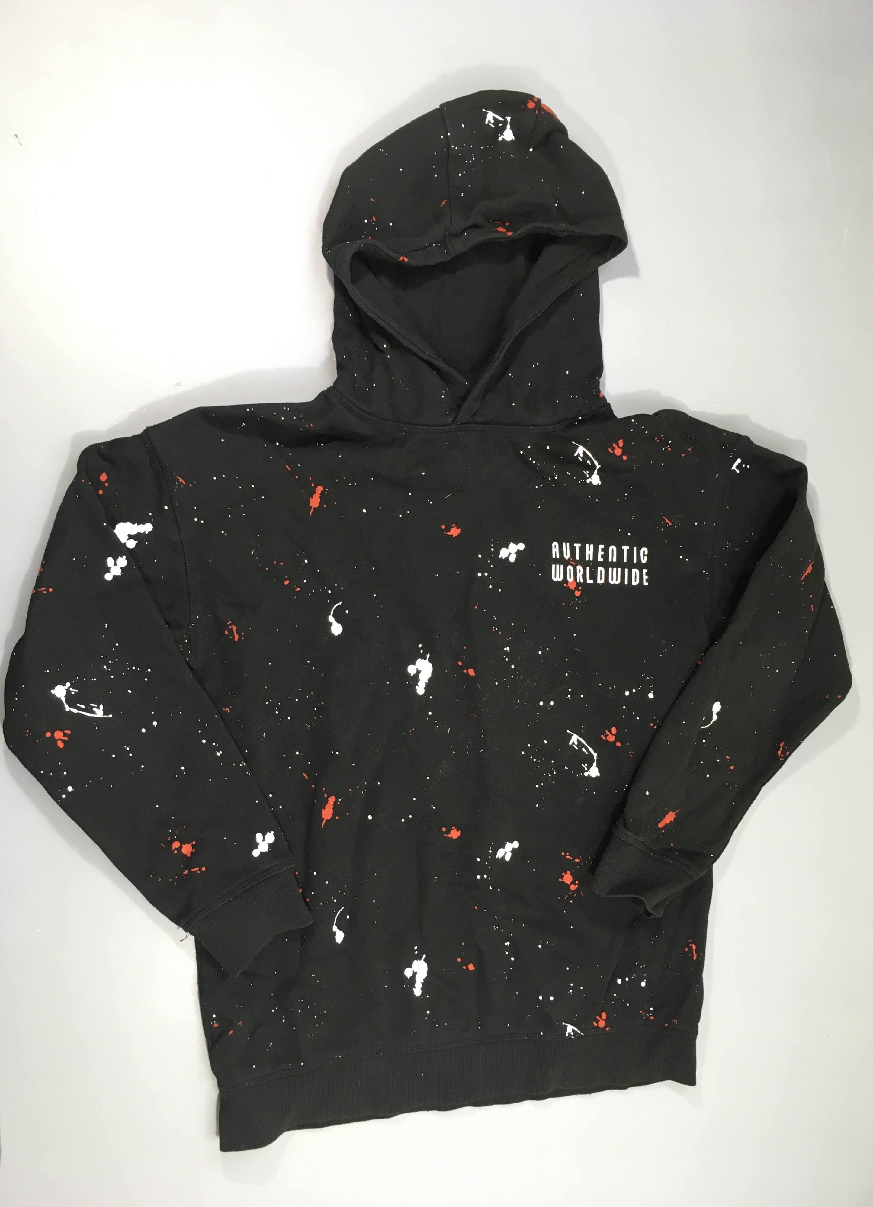 Sweat à capuche noir motifs effet tâches, un peu bouloché