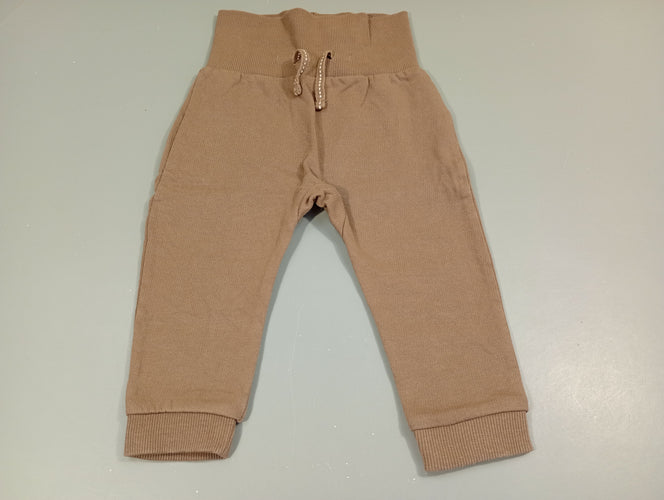 Pantalon  molleton brun, taille et chevilles élastiques, moins cher chez Petit Kiwi