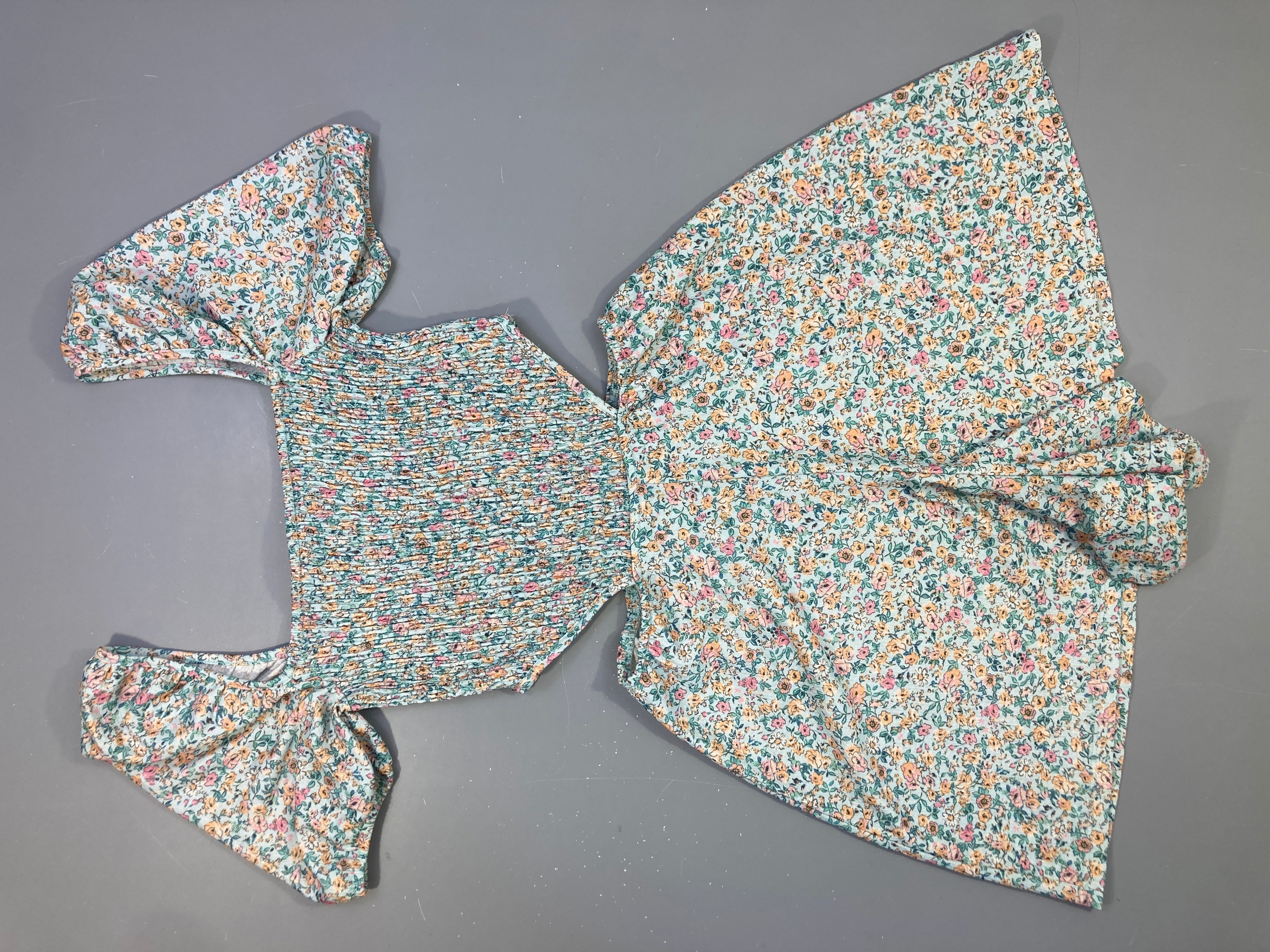 Combishort bleu-clair fleuri s.mocks buste ouvert cotés taille