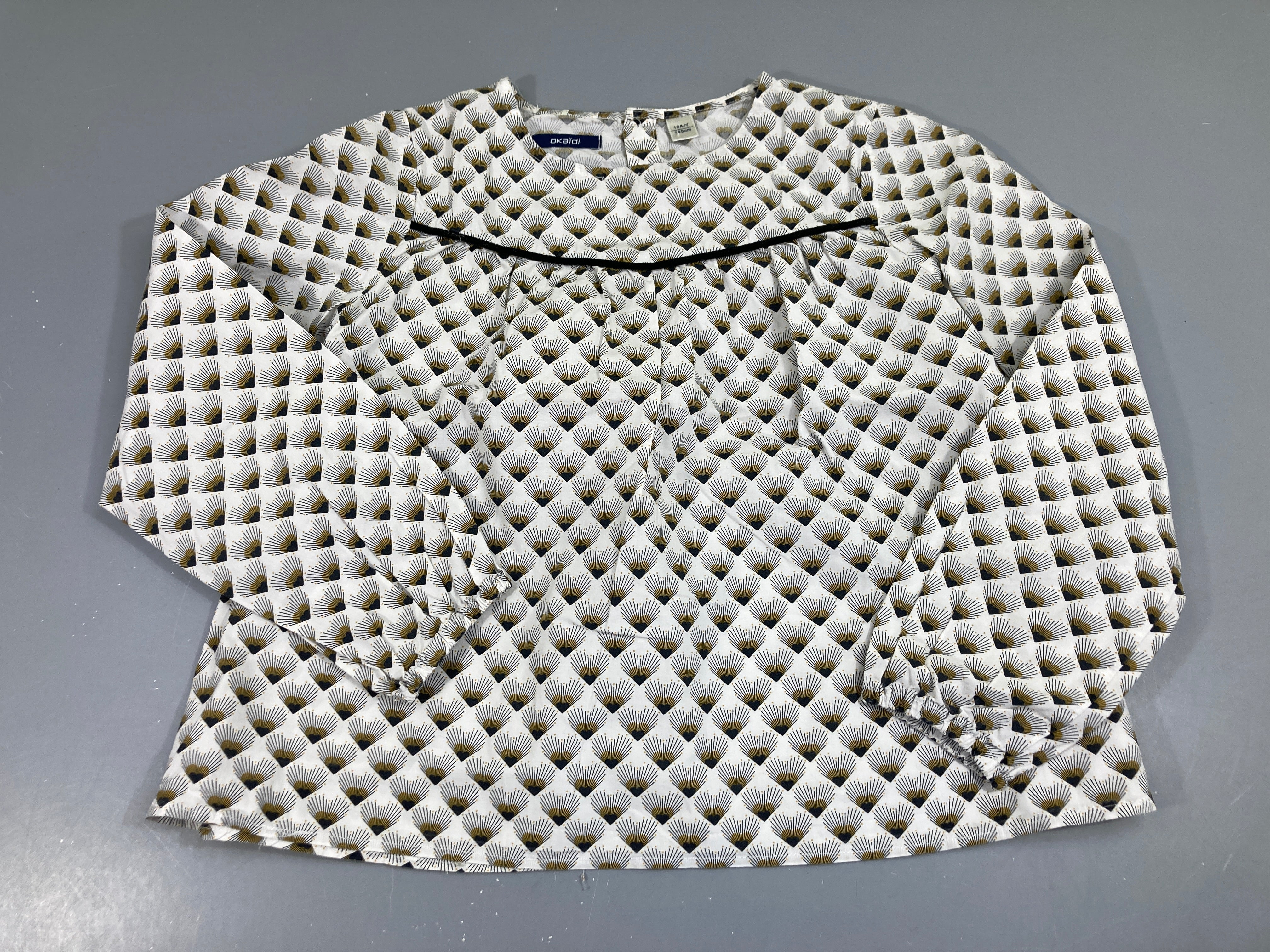 Blouse m.l  coton blanc motifs art déco