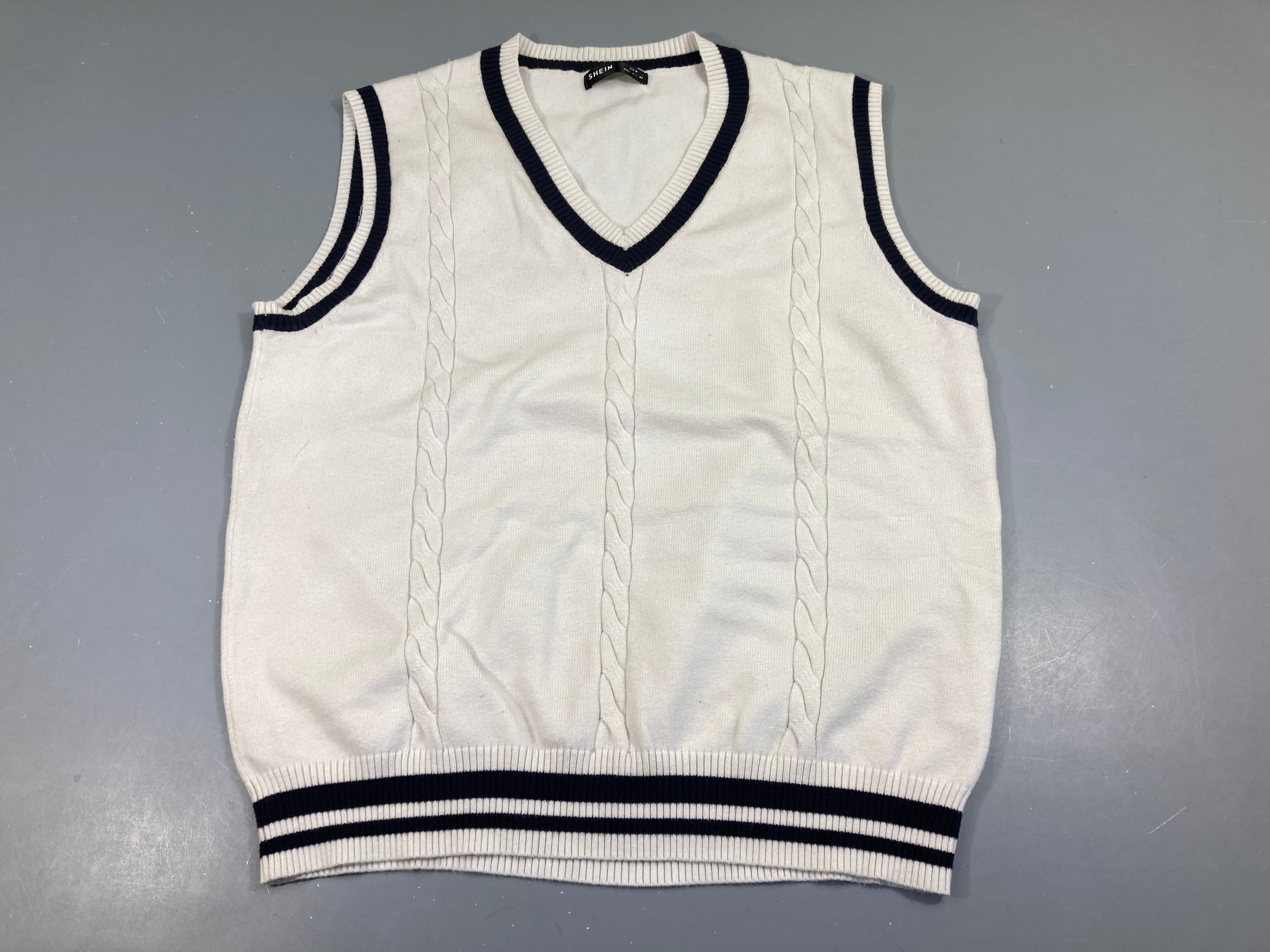 Gilet s.m blanc bord bleu marine