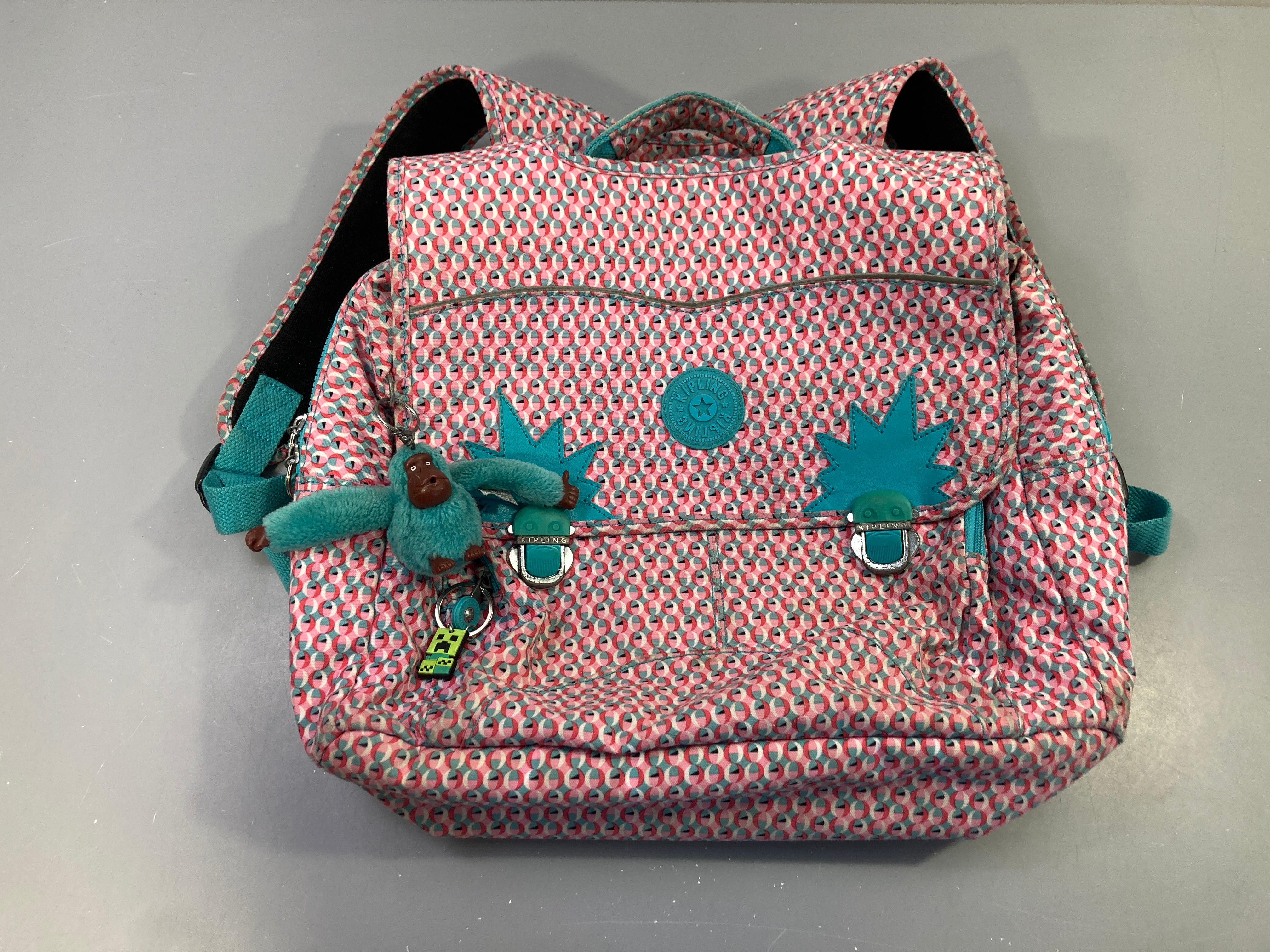 Cartable primaire rose motifs, légères traces d'usures