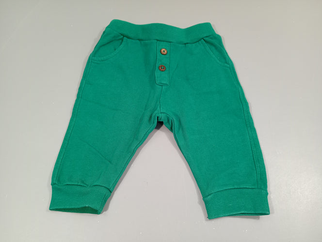 Pantalon molleton vert, taille et chevilles élastiques, moins cher chez Petit Kiwi