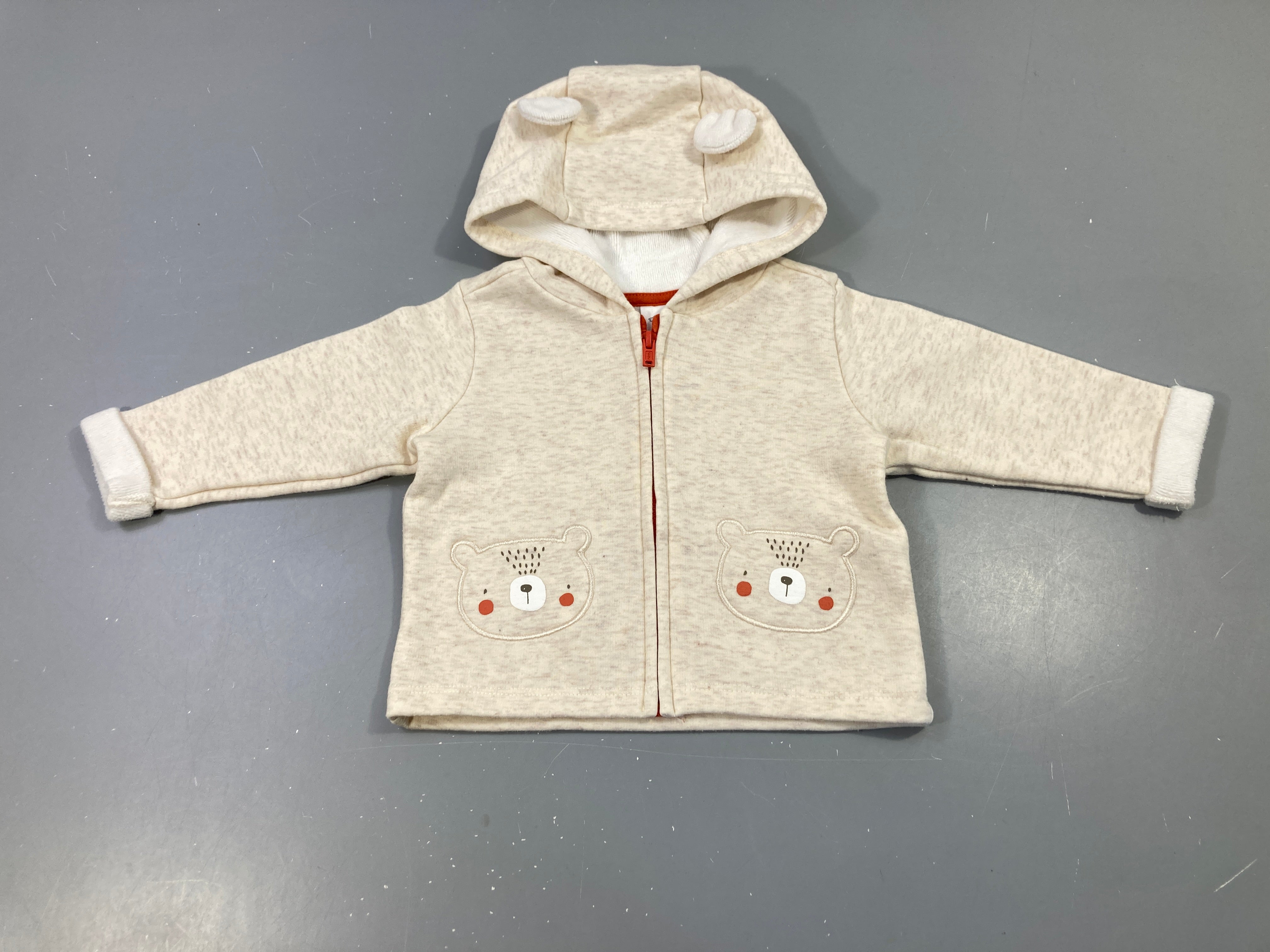 Swet zippé à capuche beige clair chiné, têtes d'oursons, intérieur doux et chaud. Légèrement bouloché