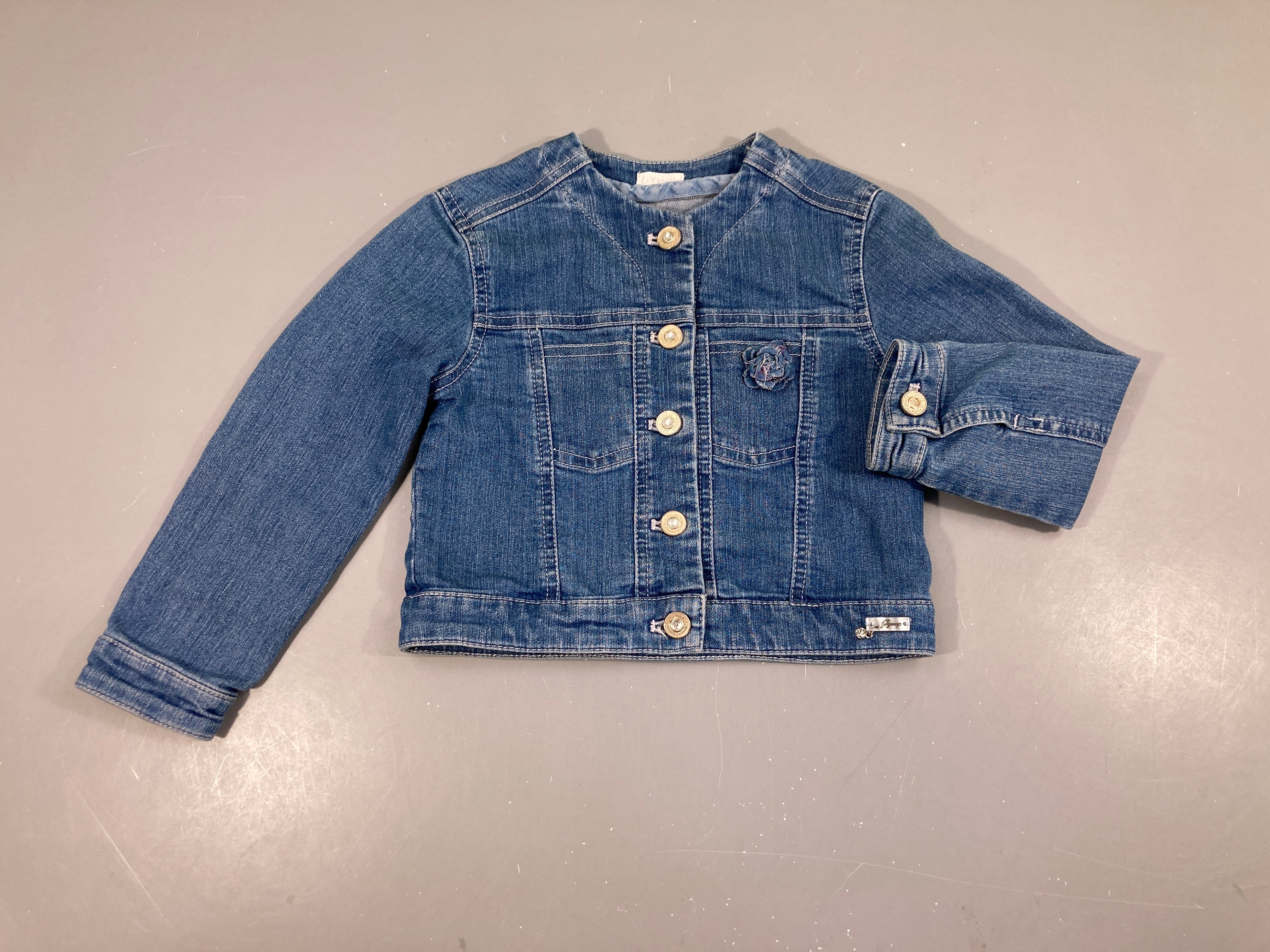 Veste en jean  boutons strass