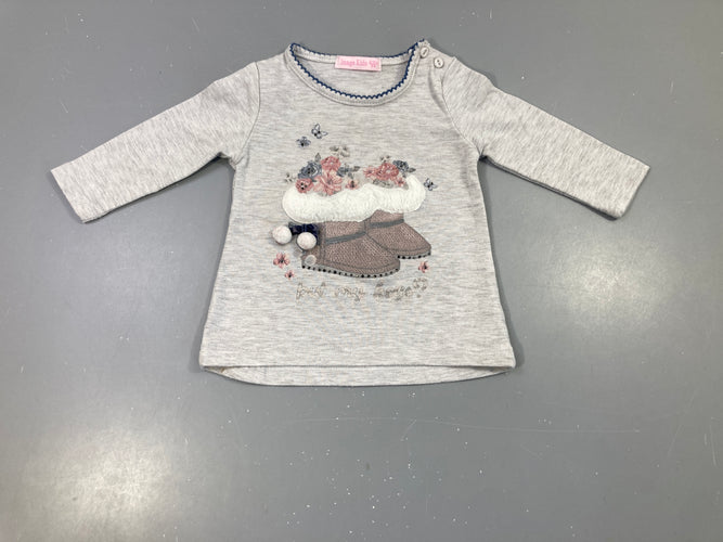T-shirt m.l gris clair flammé, motif botte de neige avec pompons et petits strass. Légèrement bouloché, moins cher chez Petit Kiwi