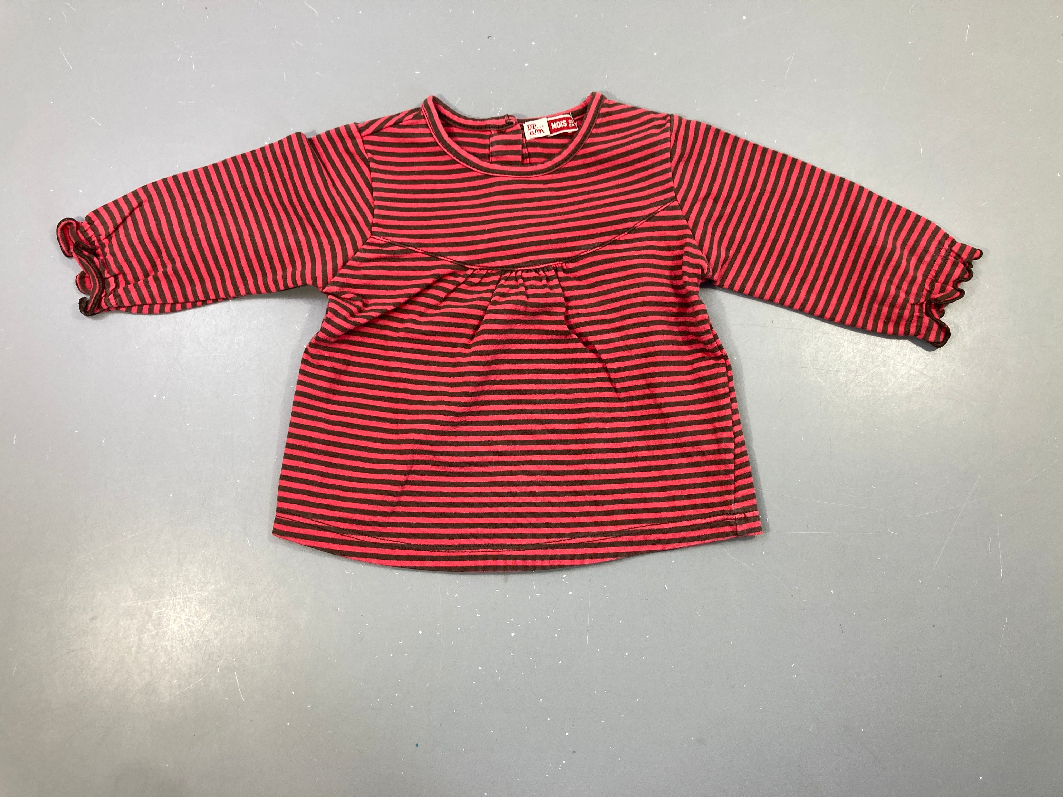 T-shirt m.l rayé rose et brun , manches élastiques au niveau des poignets, très légèrement bouloché