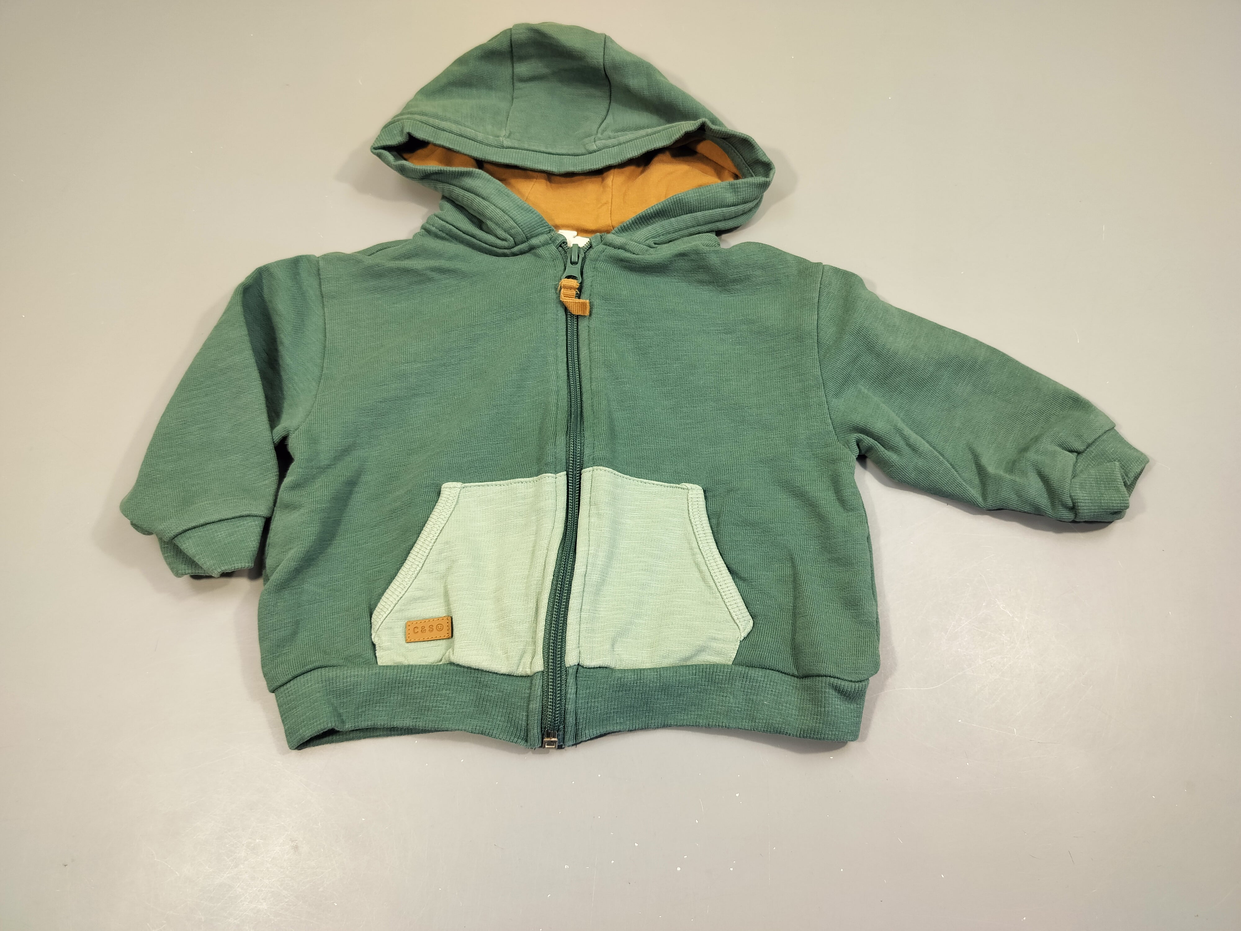 Sweat zippé à capuche vert flammé, poche à l'avant