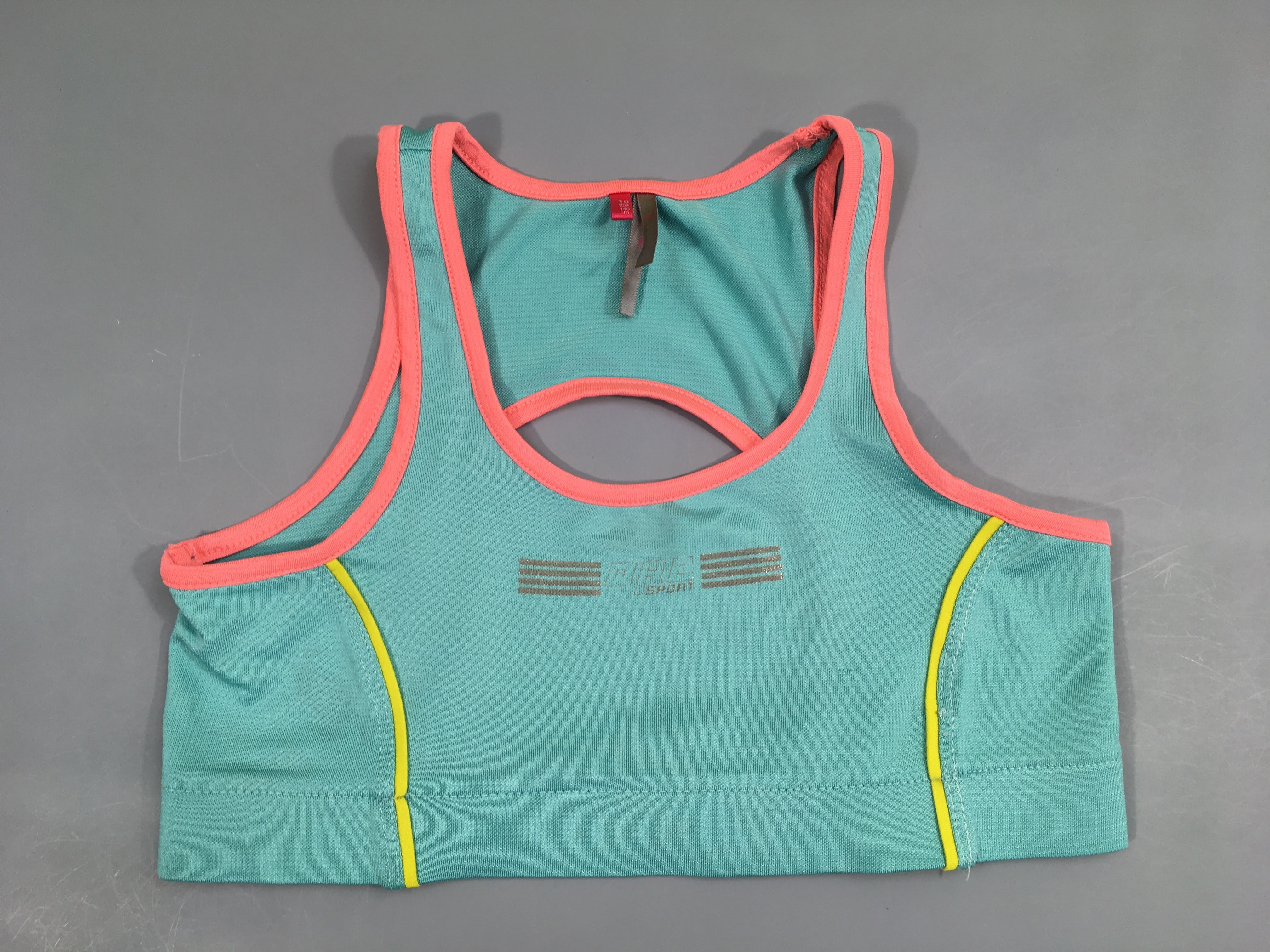 Brassière de sport turquoise bords rose