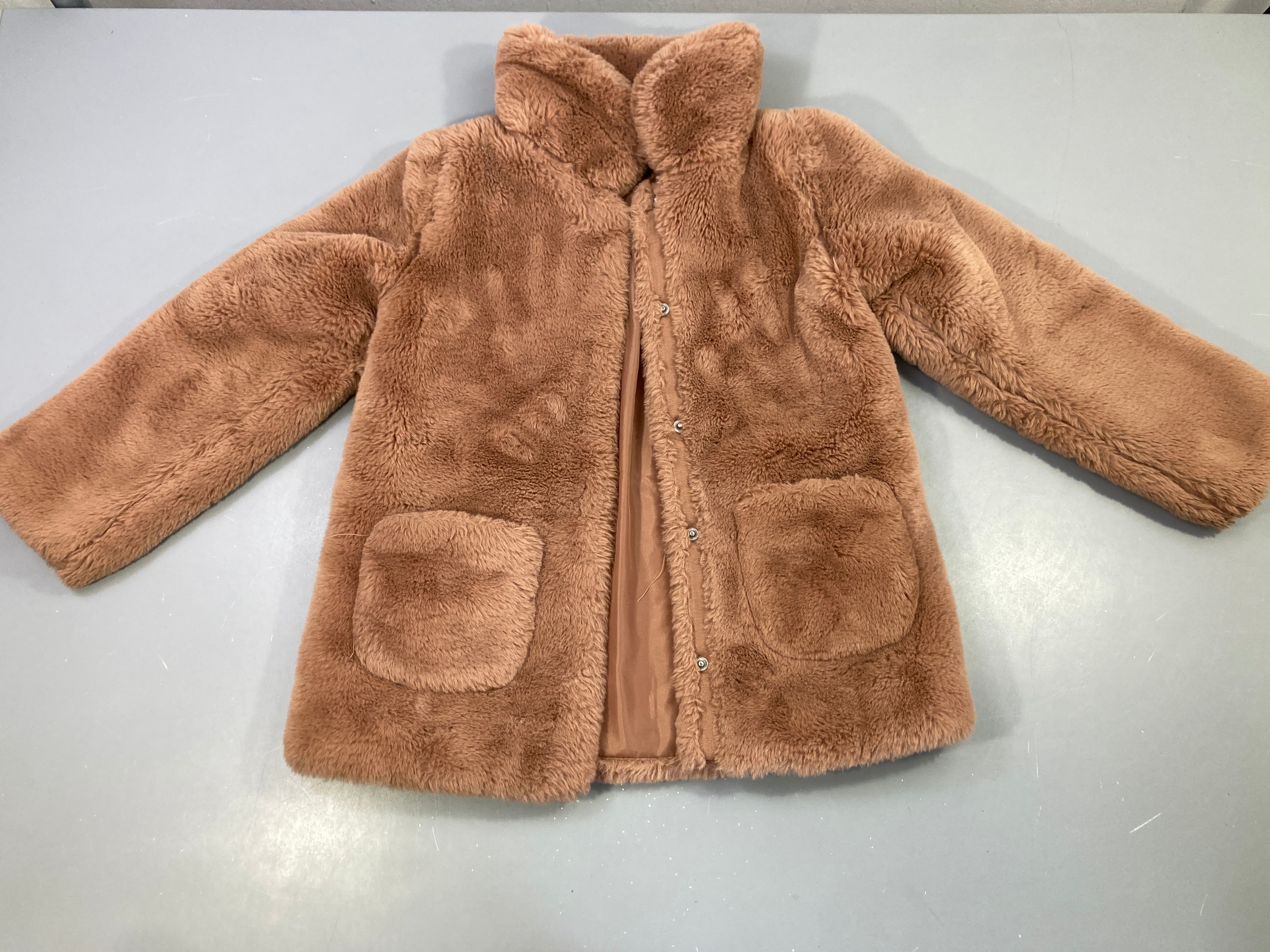 Veste peluche brune fermeture par pressions