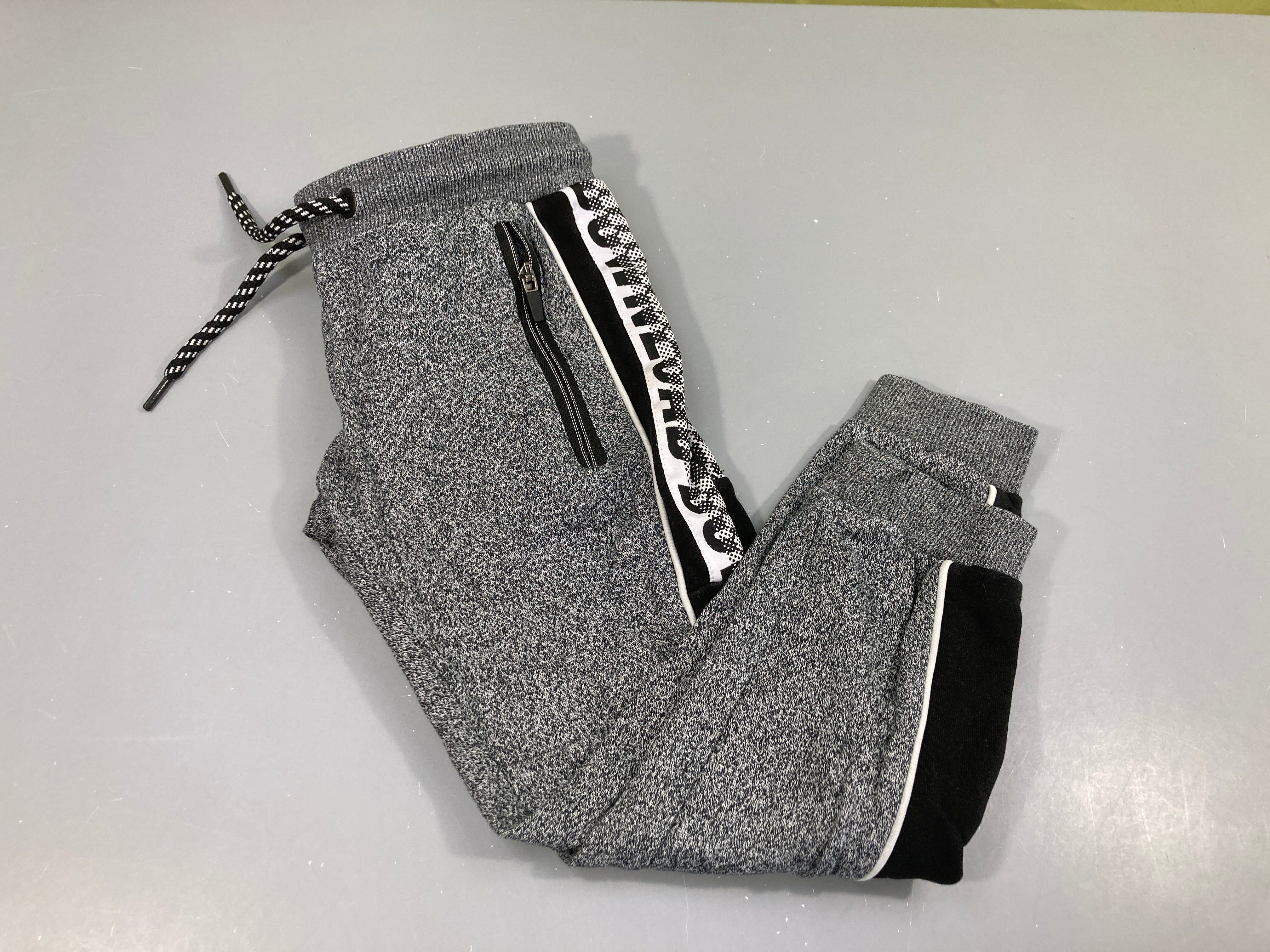 Pantalon de training molleton noir chiné blanc