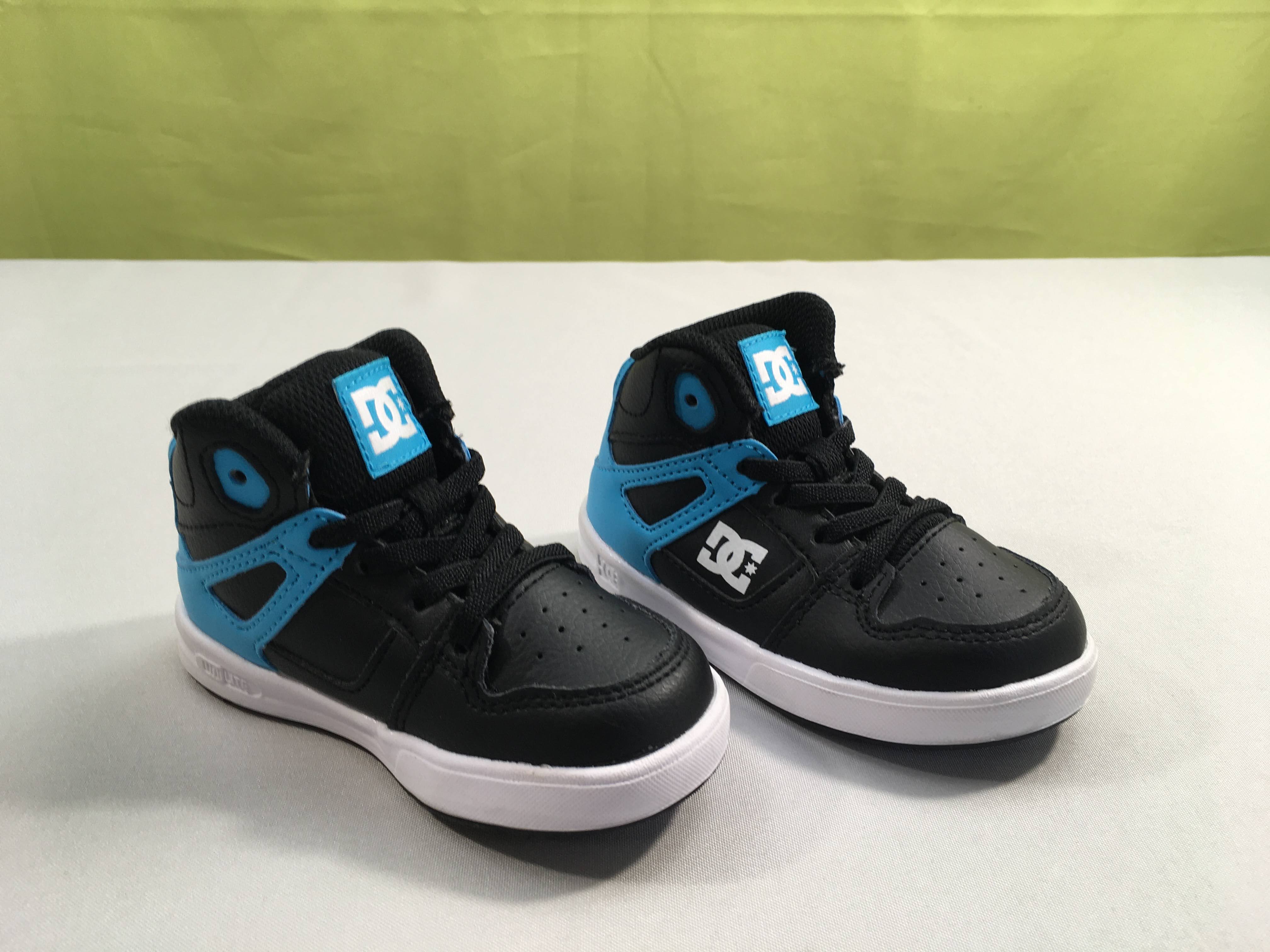Etat Neuf Baskets montantes DC ft Uni lite bleu/noir, 23