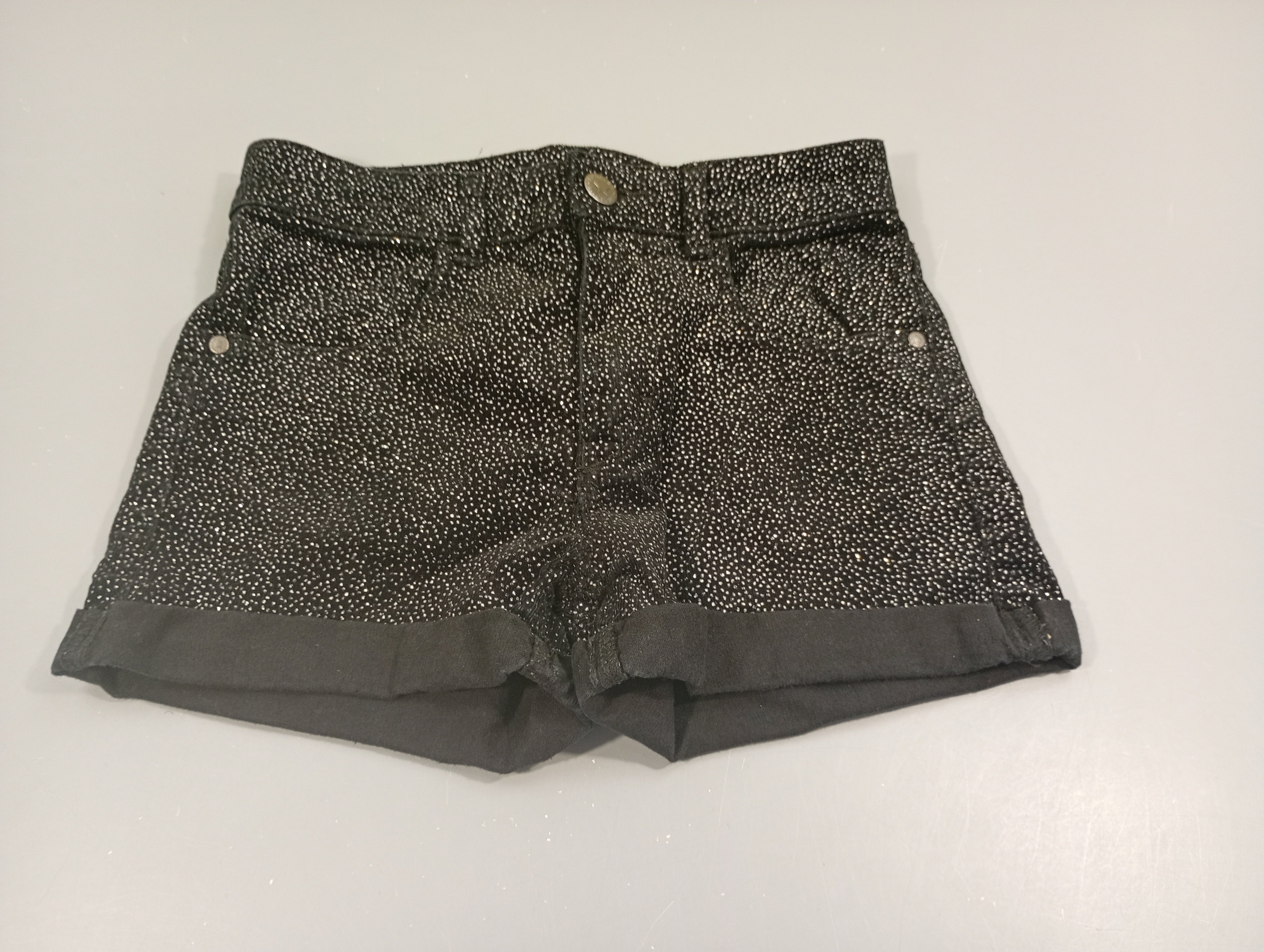 Short velours noir à paillettes  à revers