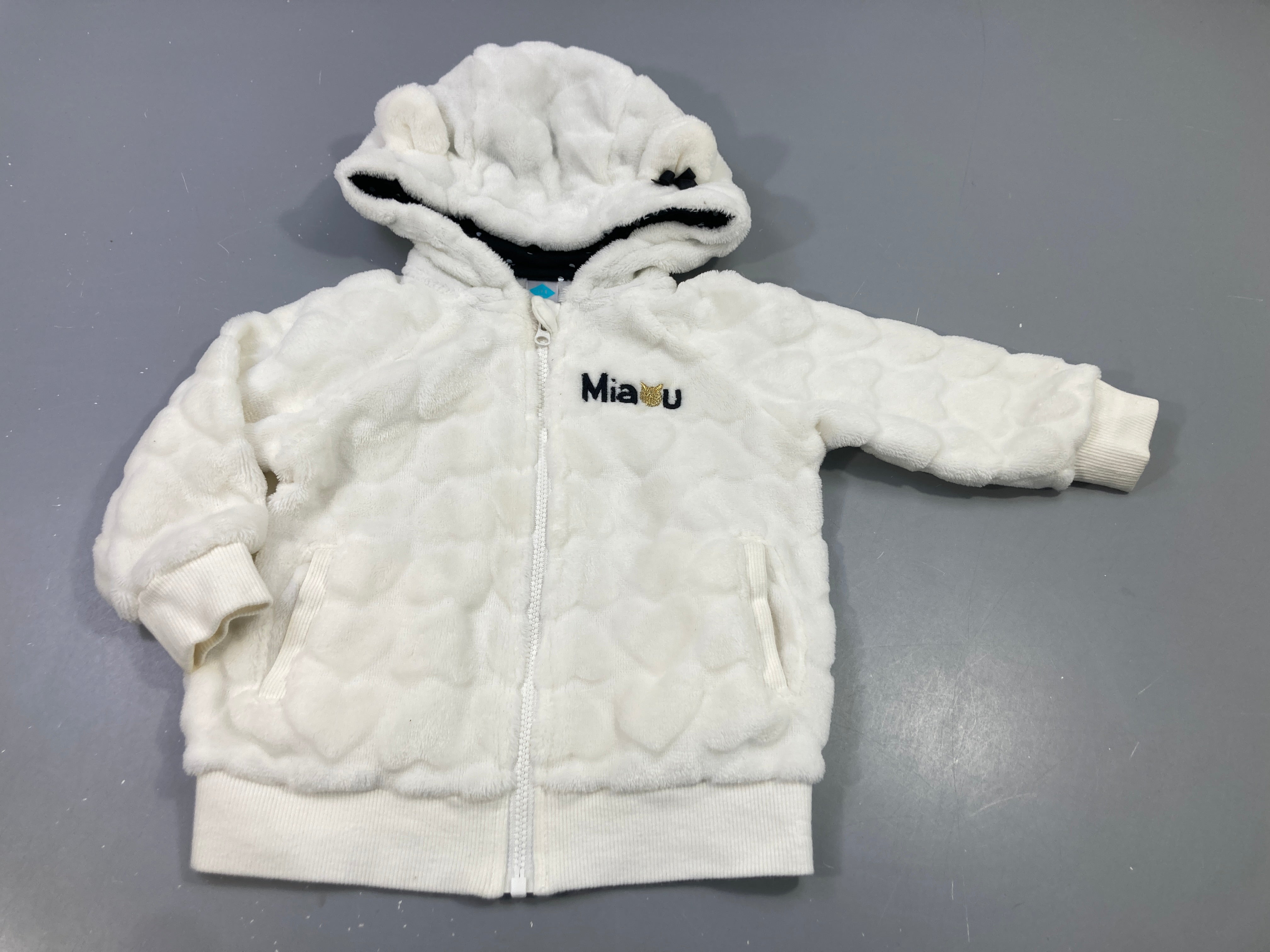 Gilet blanc zippé à capuche en velours texturé coeurs 