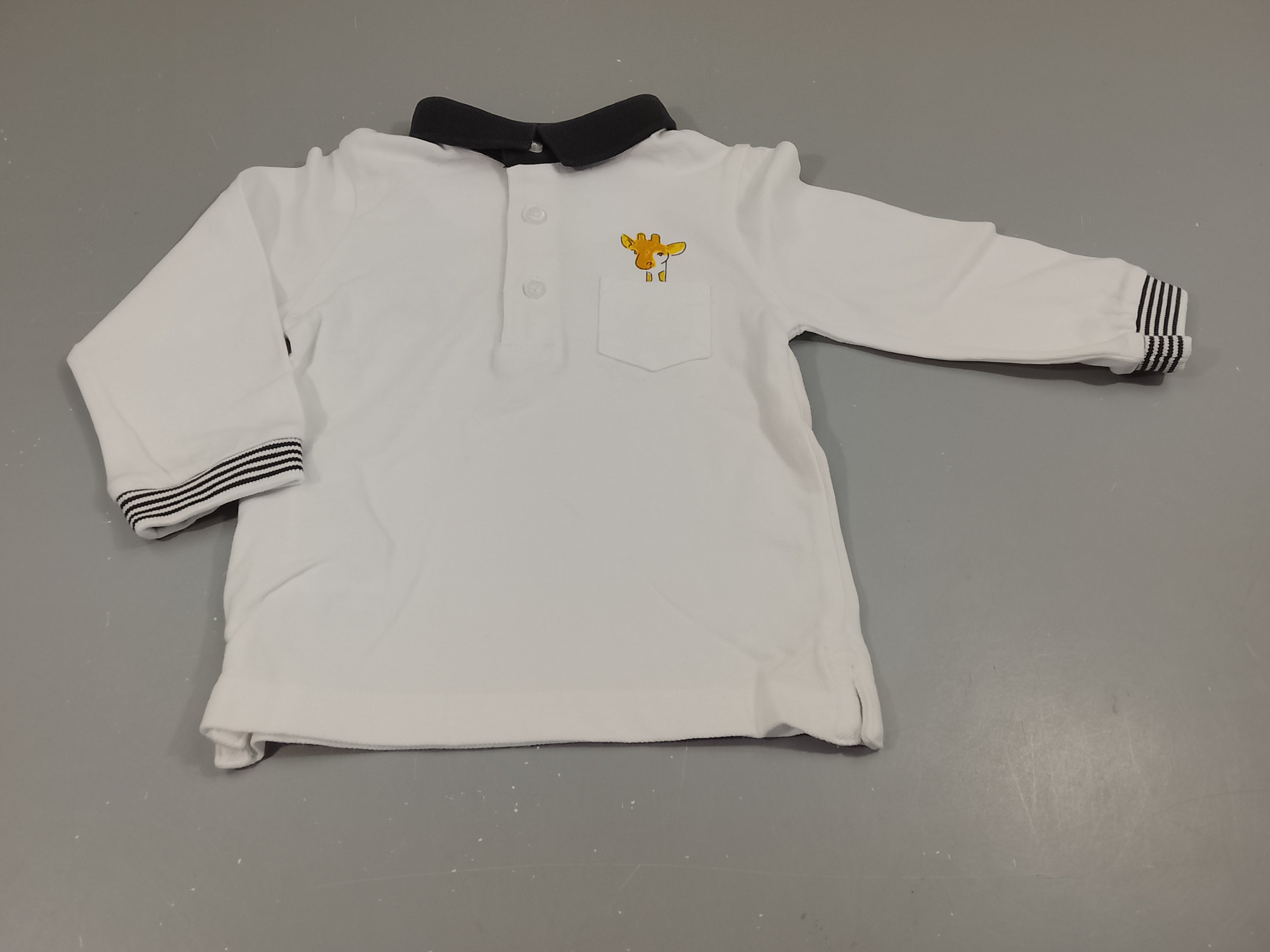Polo ml blanc, col noir,poche tête de girafe