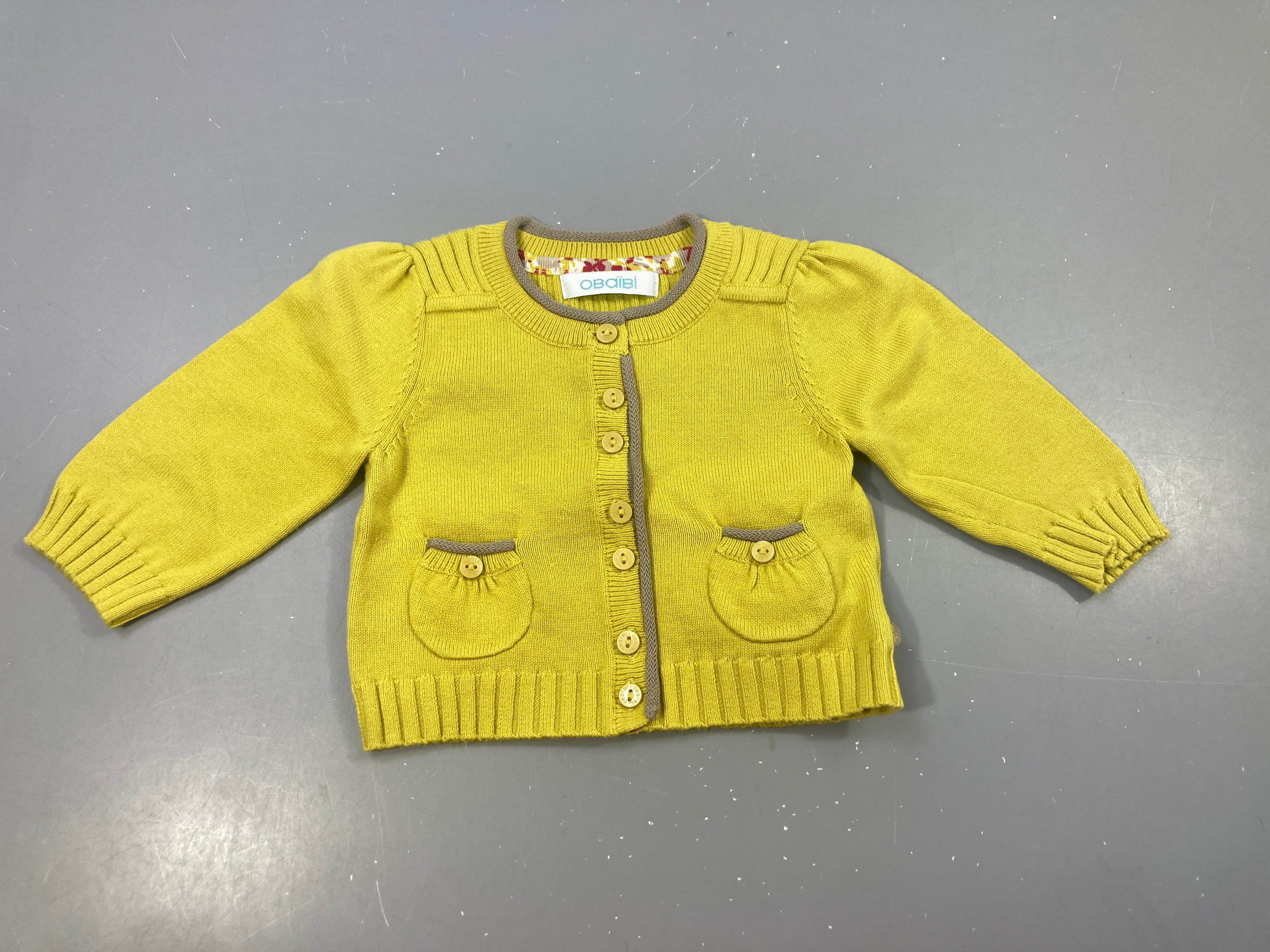 Gilet jaune bord beige