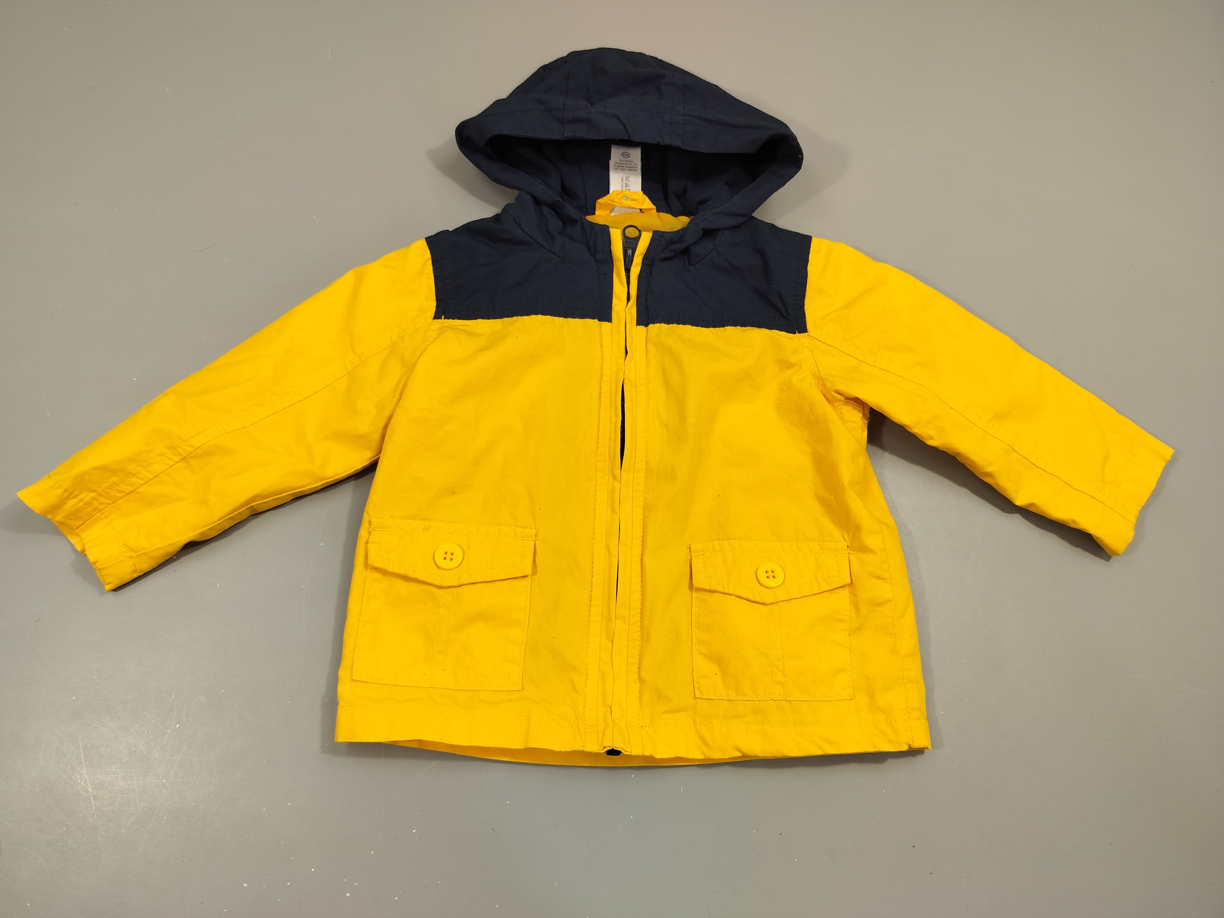 Veste  style coupe- vent zippée à capuche  jaune et bleu marine