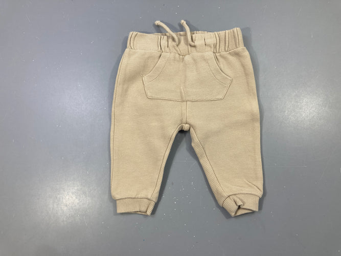 Pantalon beige molleton texturé, moins cher chez Petit Kiwi