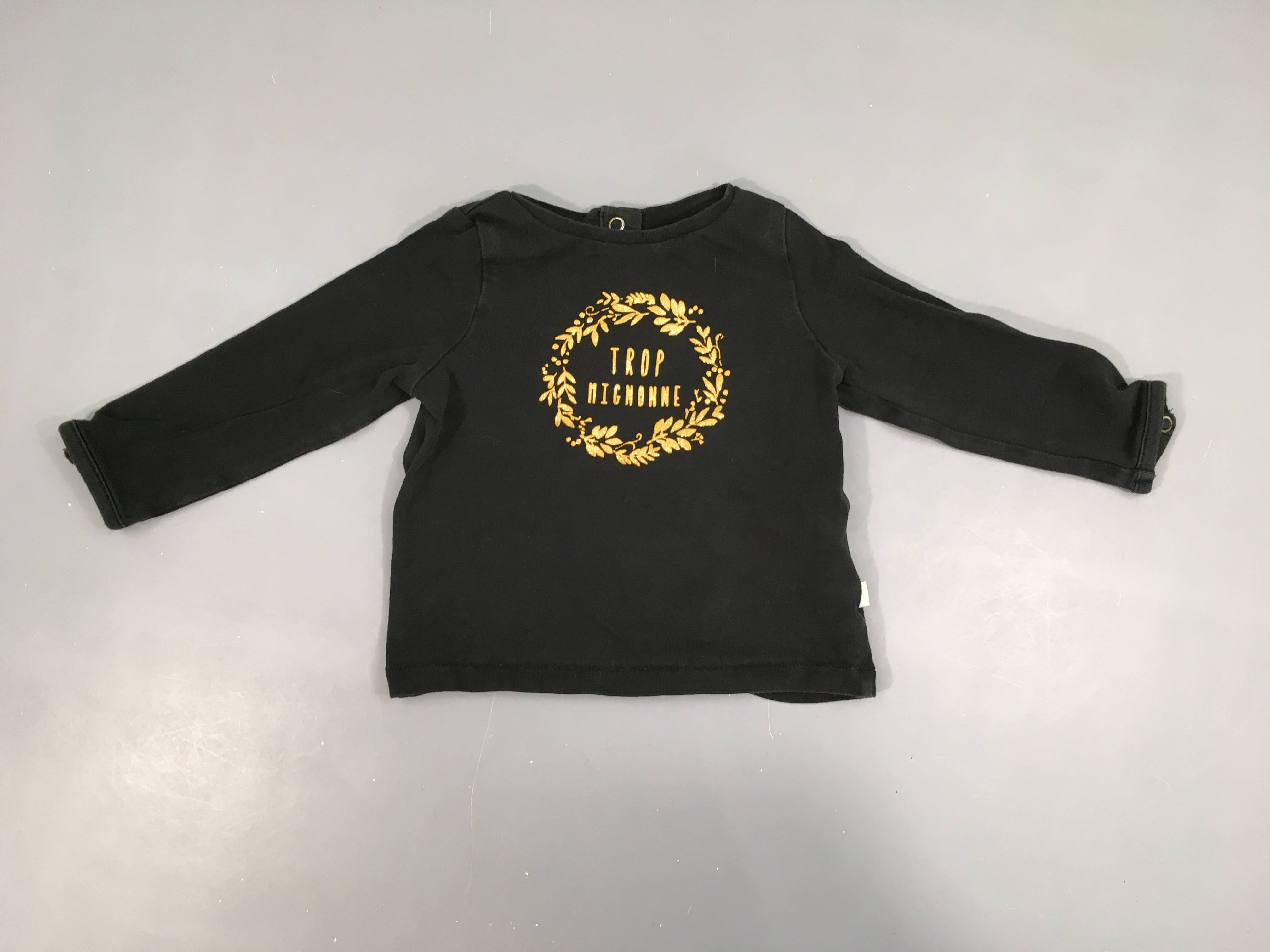 T-shirt m.l noir Trop, légèrement bouloché