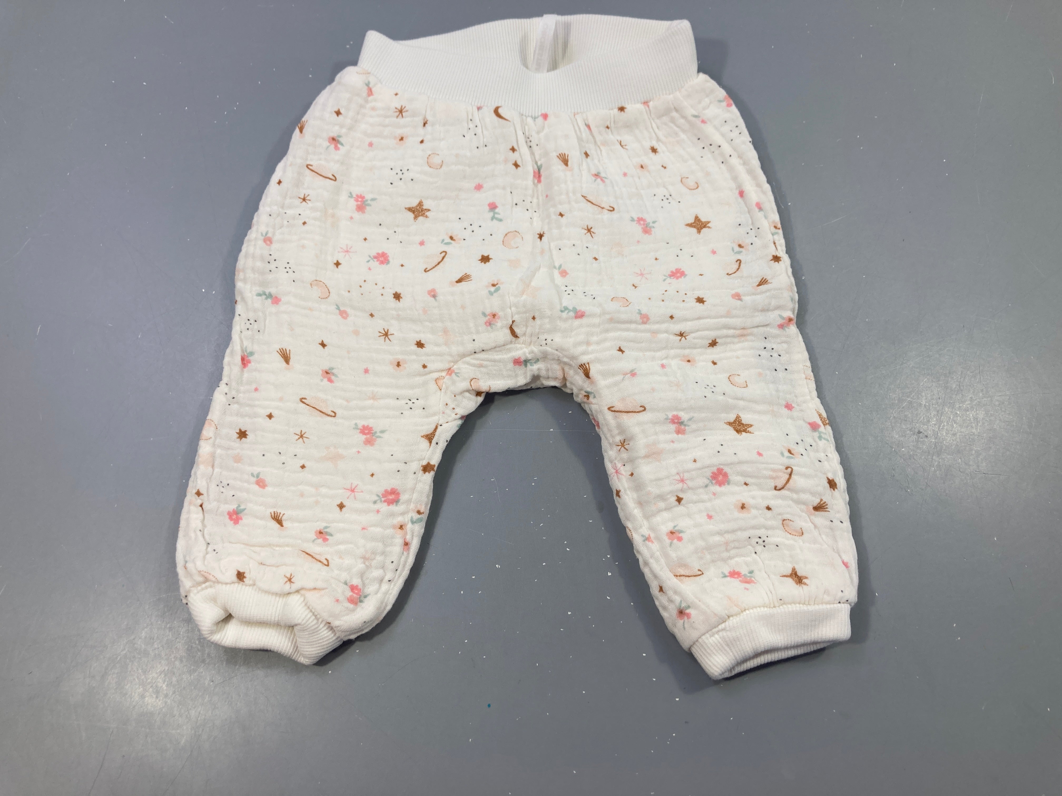 Pantalon tetra doublé jersey et légèrement ouatiné écru astres fleuri