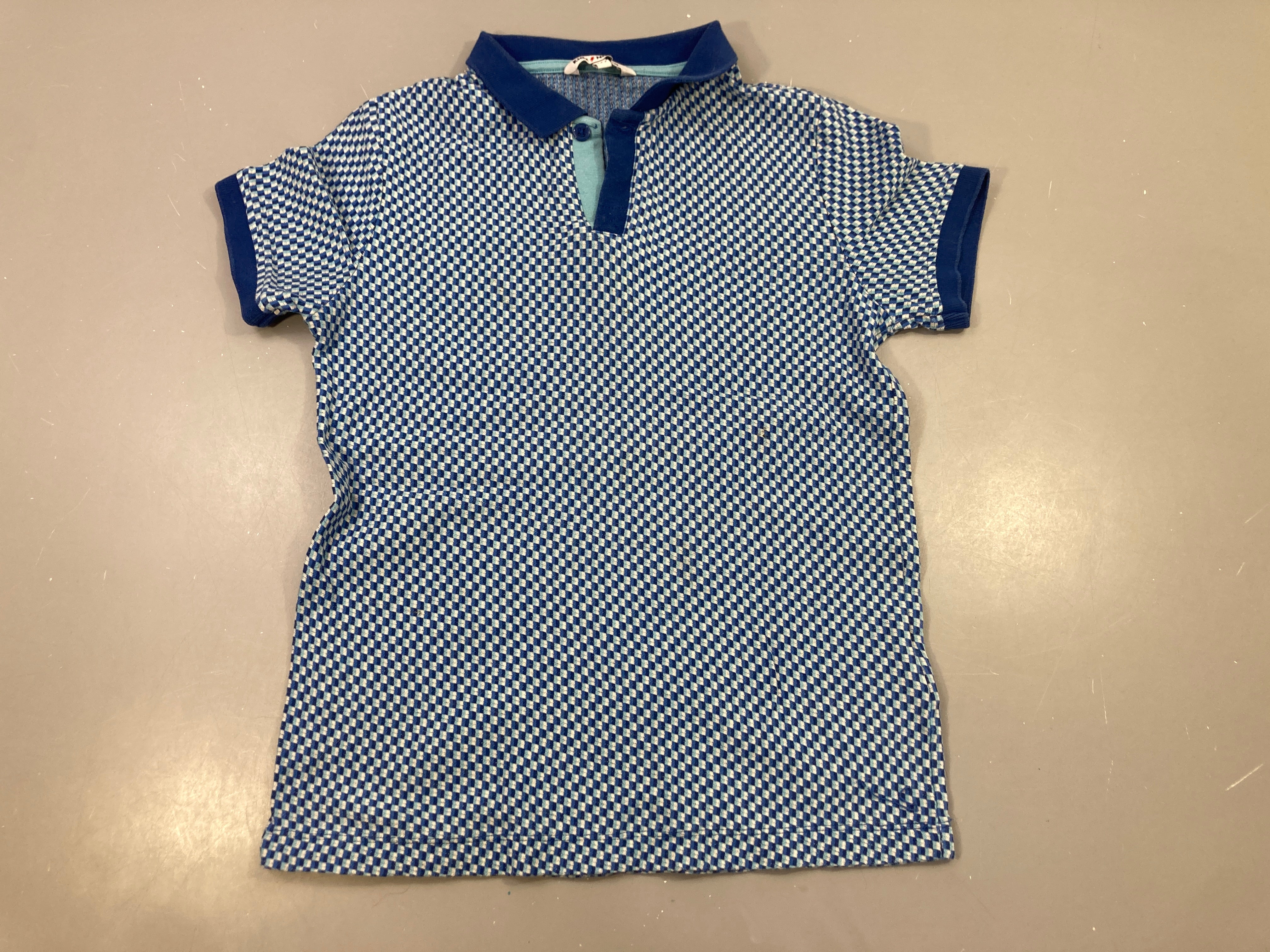 Polo mailles bleu motifs