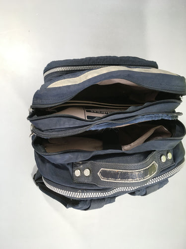 Sac à dos bleu foncé Quelques traces d'usures sur bande réfléchissante, moins cher chez Petit Kiwi