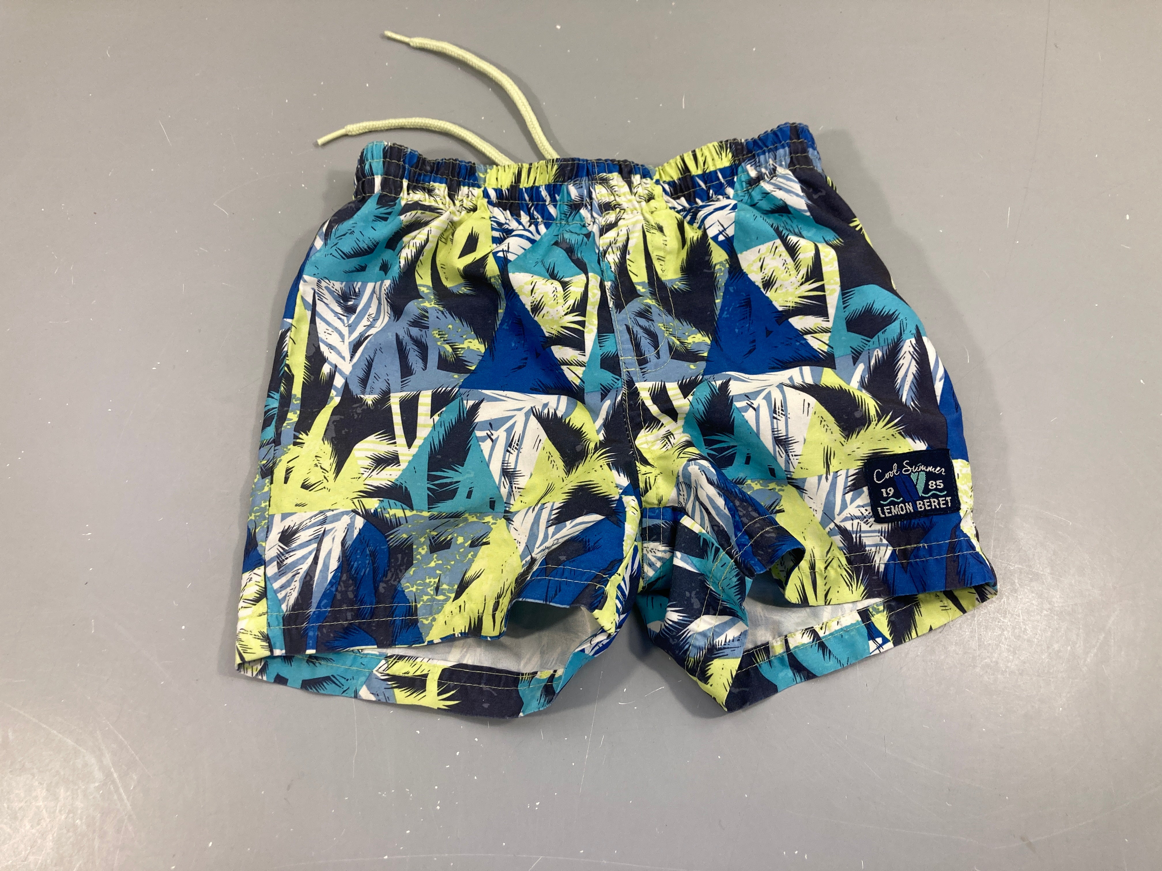 Maillot short bleu et vert