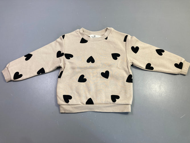 Sweat beige coeurs noirs, moins cher chez Petit Kiwi