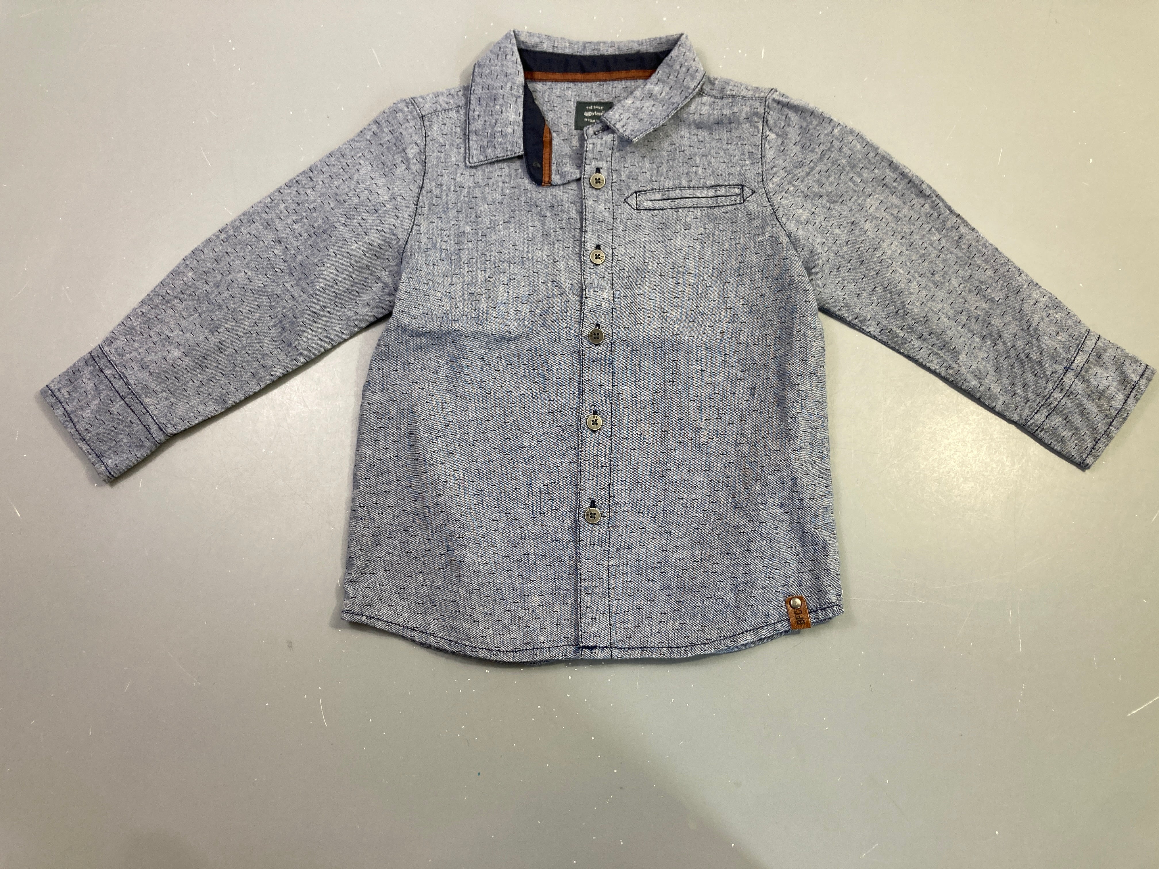 Chemise m.l bleu chinée traits poche