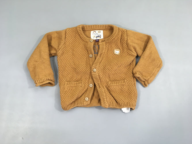 Gilet ocre lion, légèrement bouloché, moins cher chez Petit Kiwi