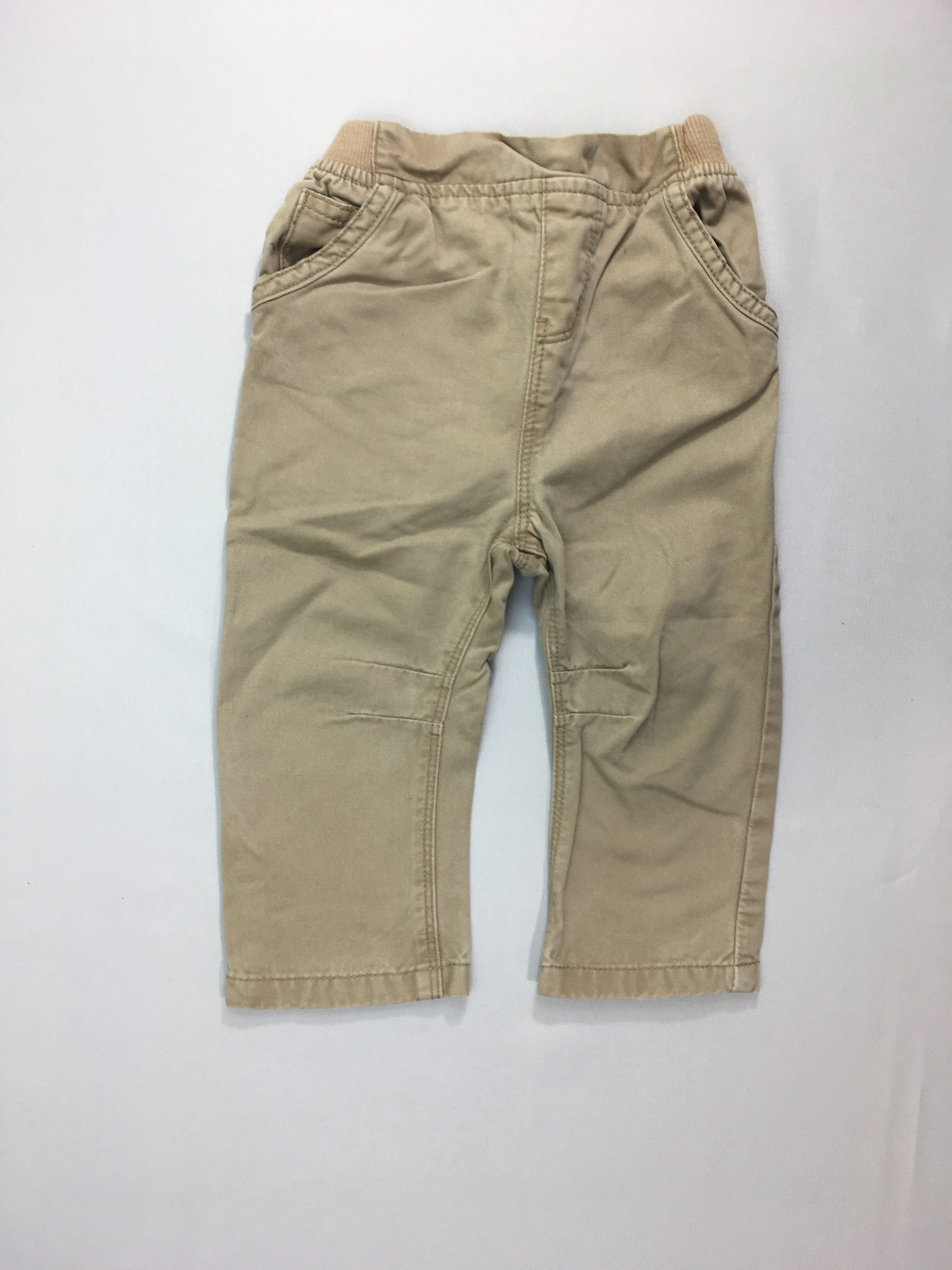 Pantalon beige sarouel, légèrement bouloché