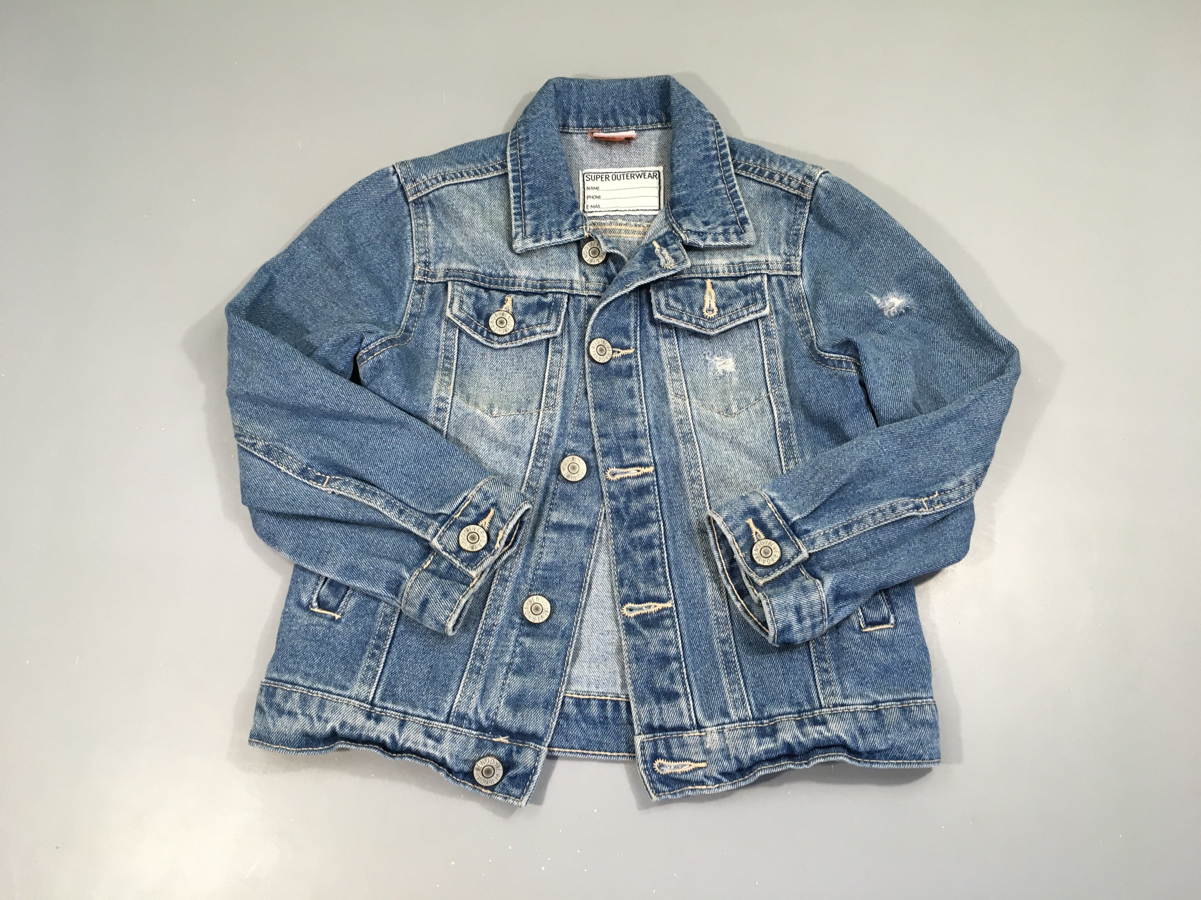 Veste en jean effet éraillé