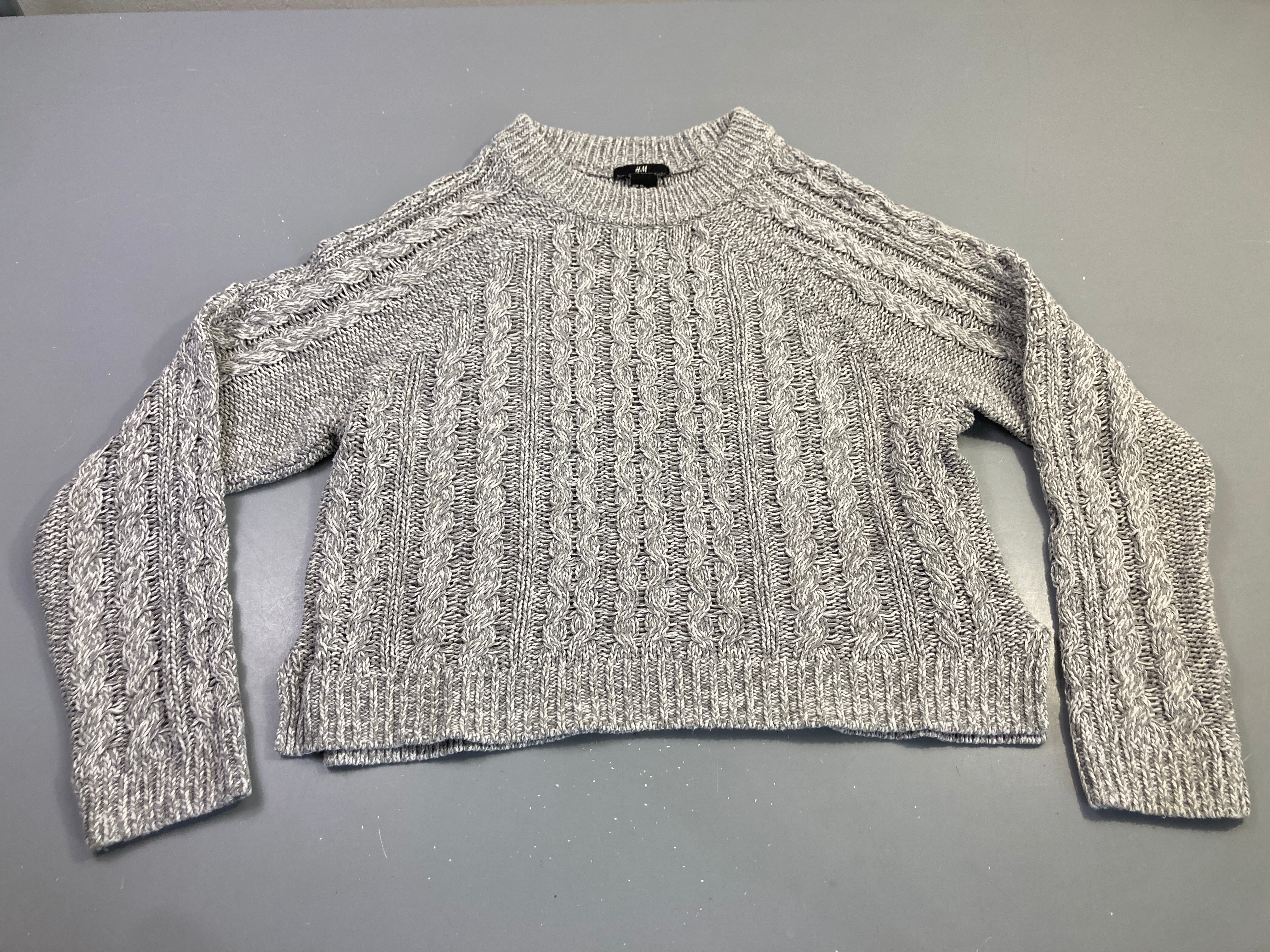Pull gris chiné torsadé