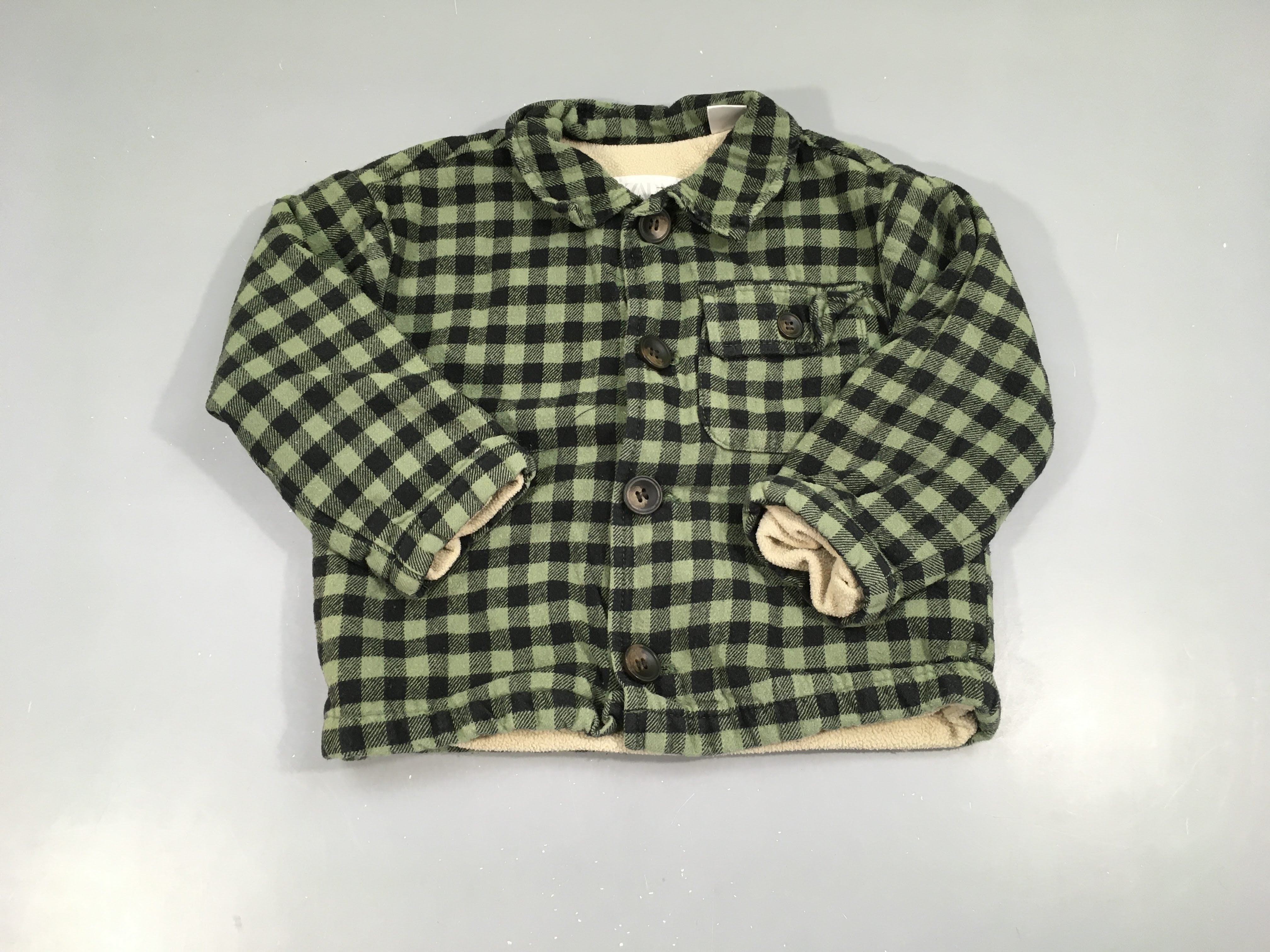 Surchemise m.l flanelle carreaux kaki/noir doublé polar, légèrement bouloché