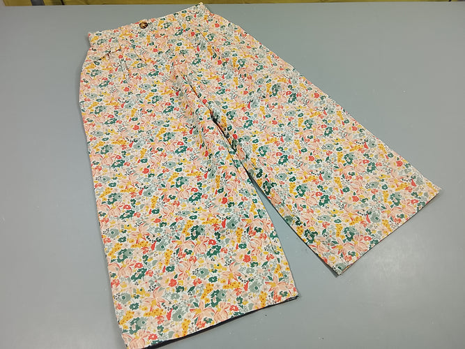 Pantalon blanc à fleurs pastel, moins cher chez Petit Kiwi