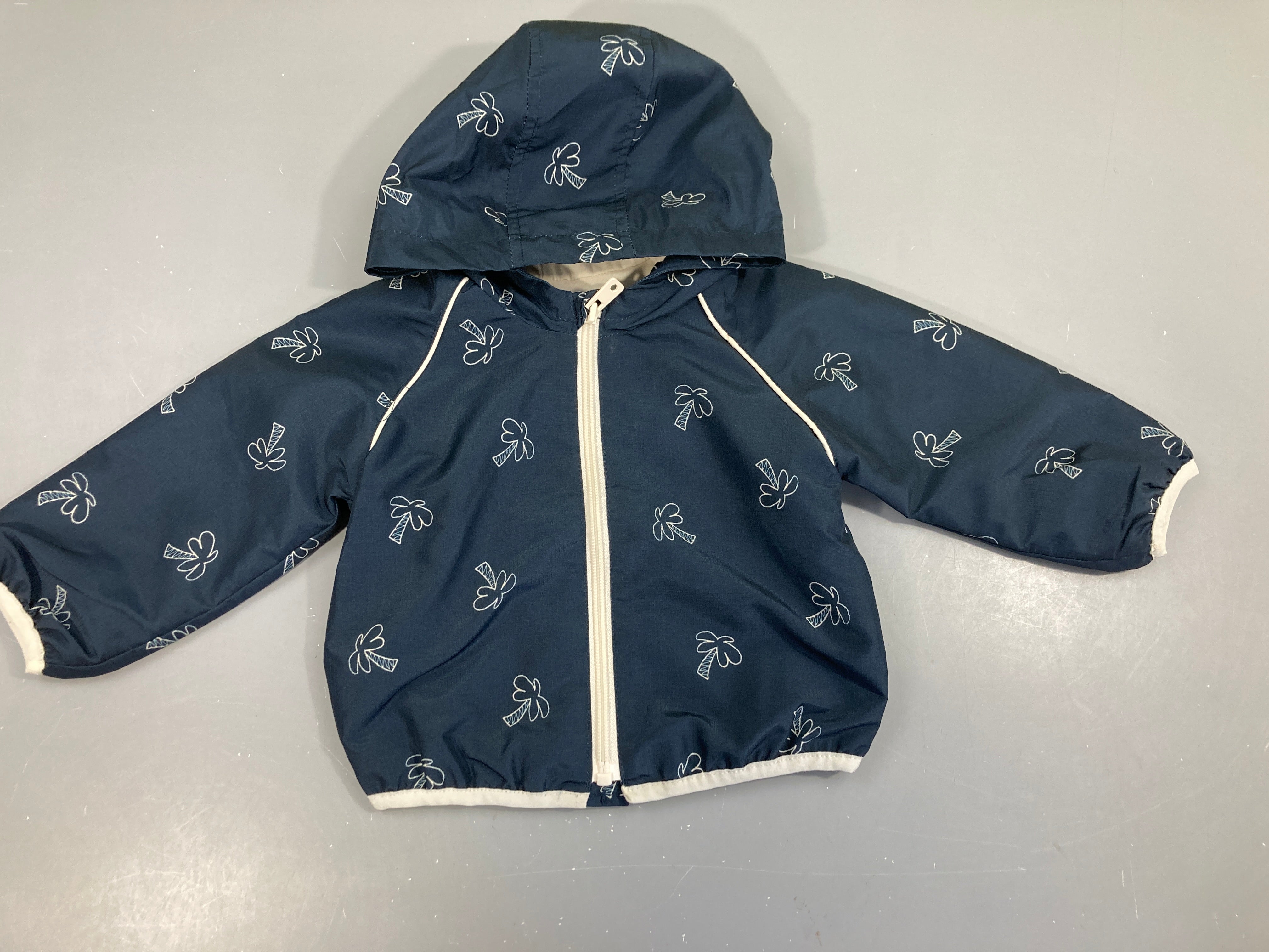 Veste légère zippée bleu foncé palmiers à capuche