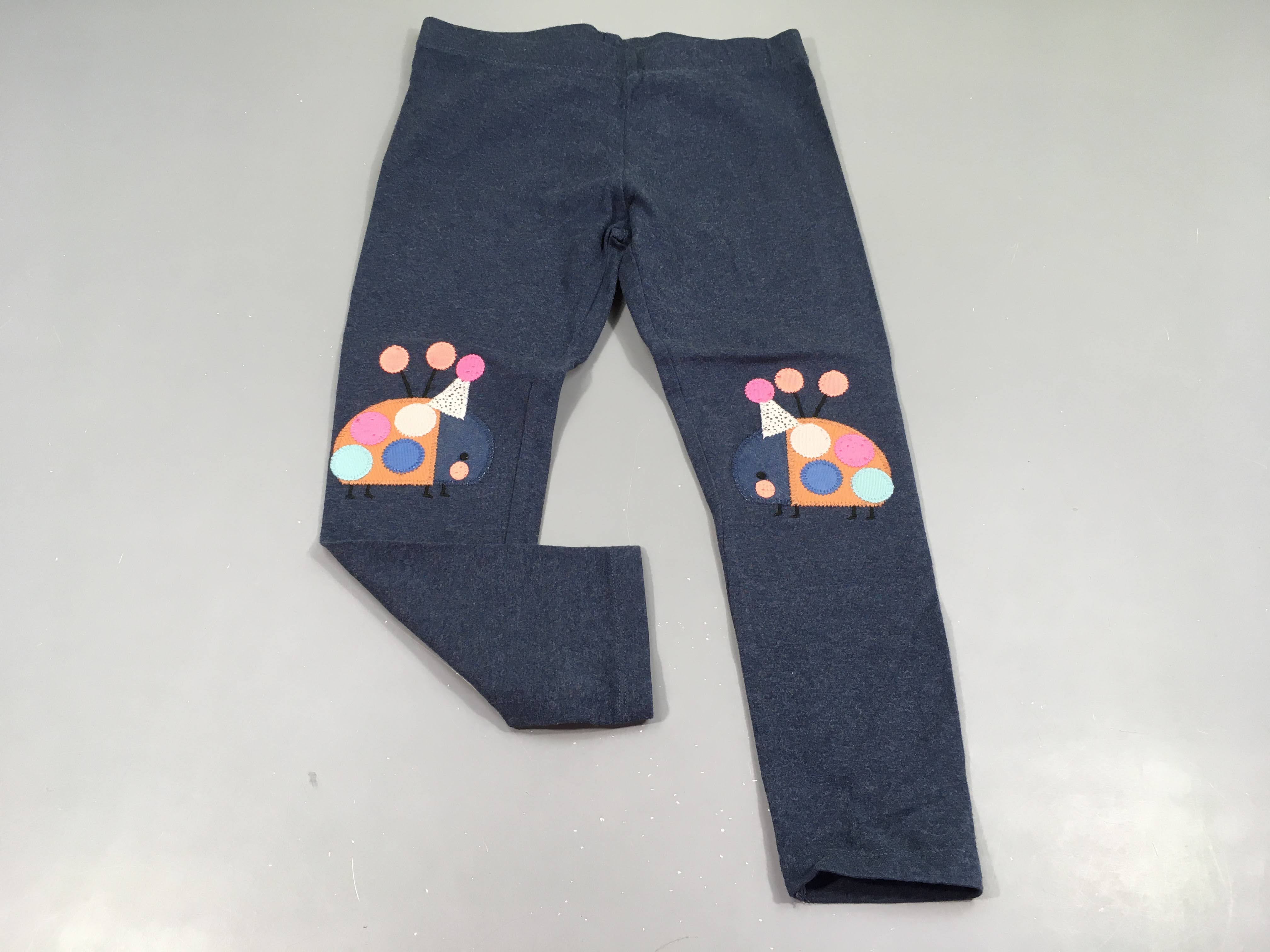 Legging bleu chiné, coccinelles aux genoux