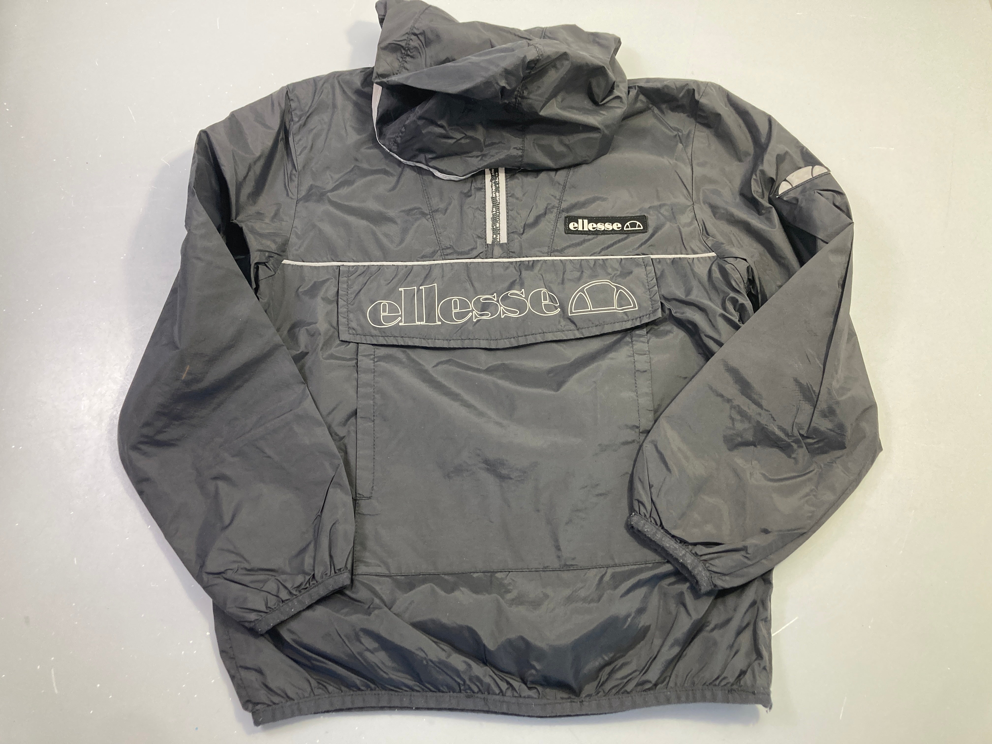 Veste de pluie à capuche noir, Ellesse, zip décoloré