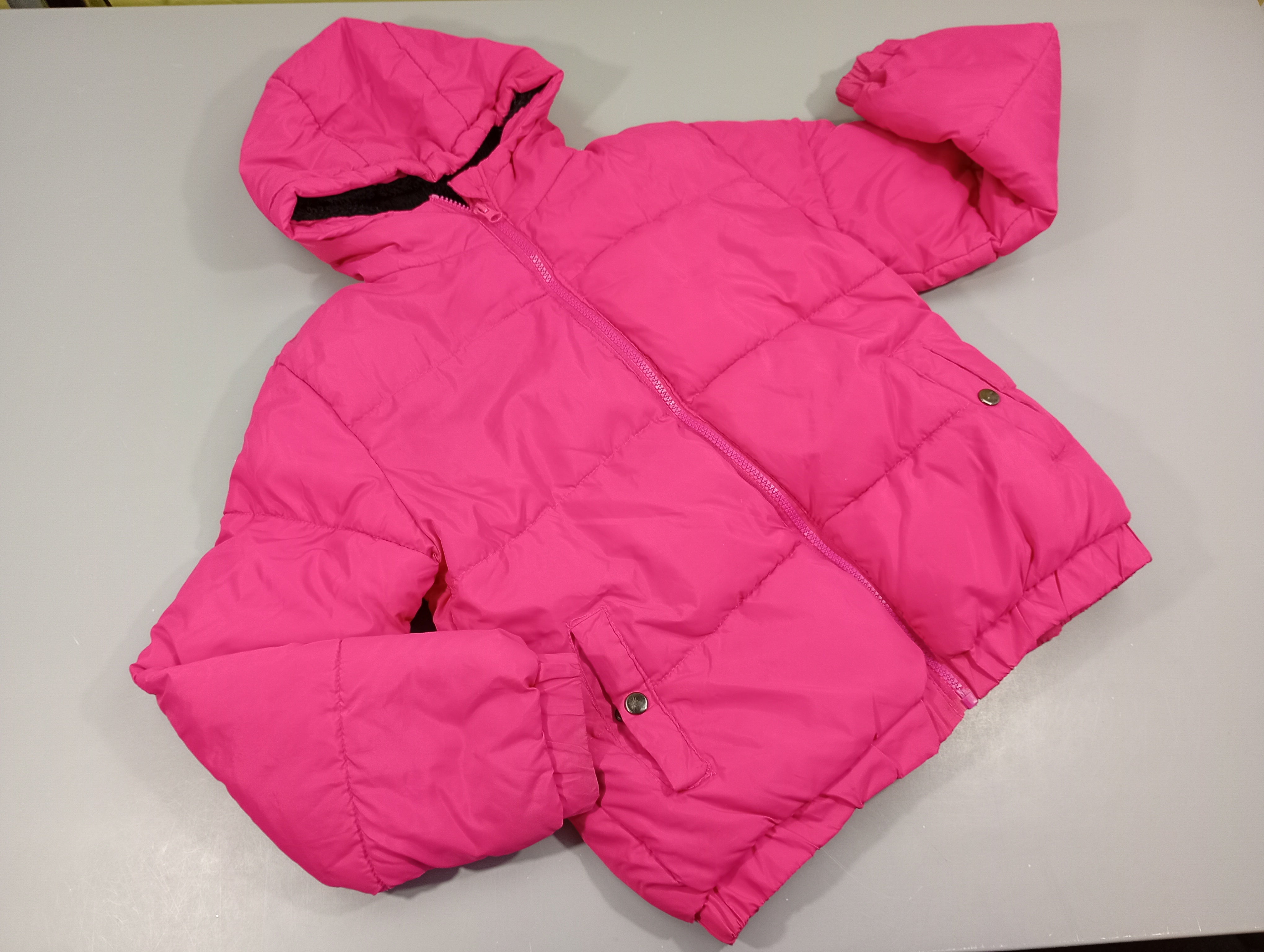 Doudoune rose , intérieur  peluche noir, quelques petites taches