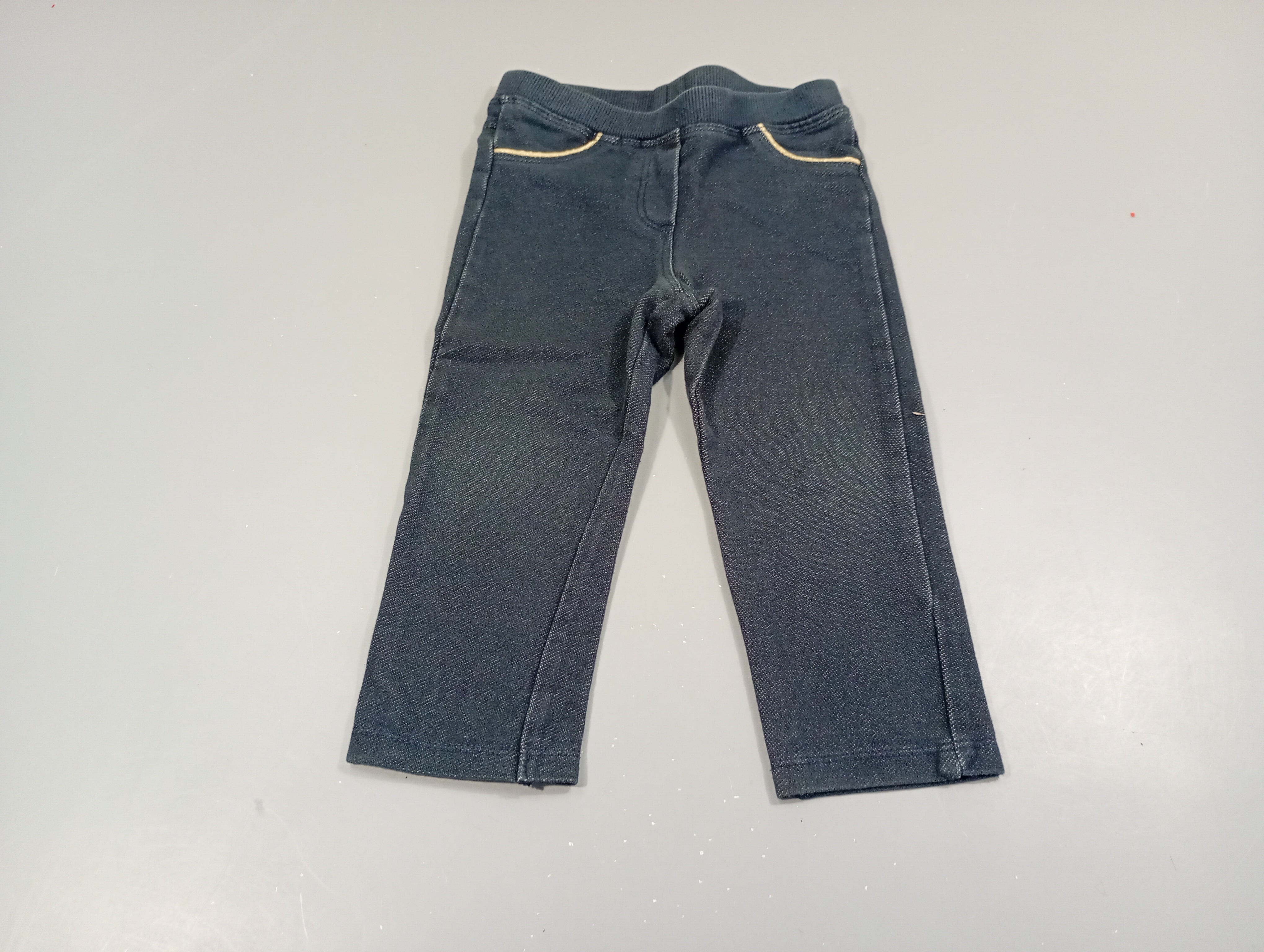 Jegging bleu marine chiné bords  des fausses poches dorés