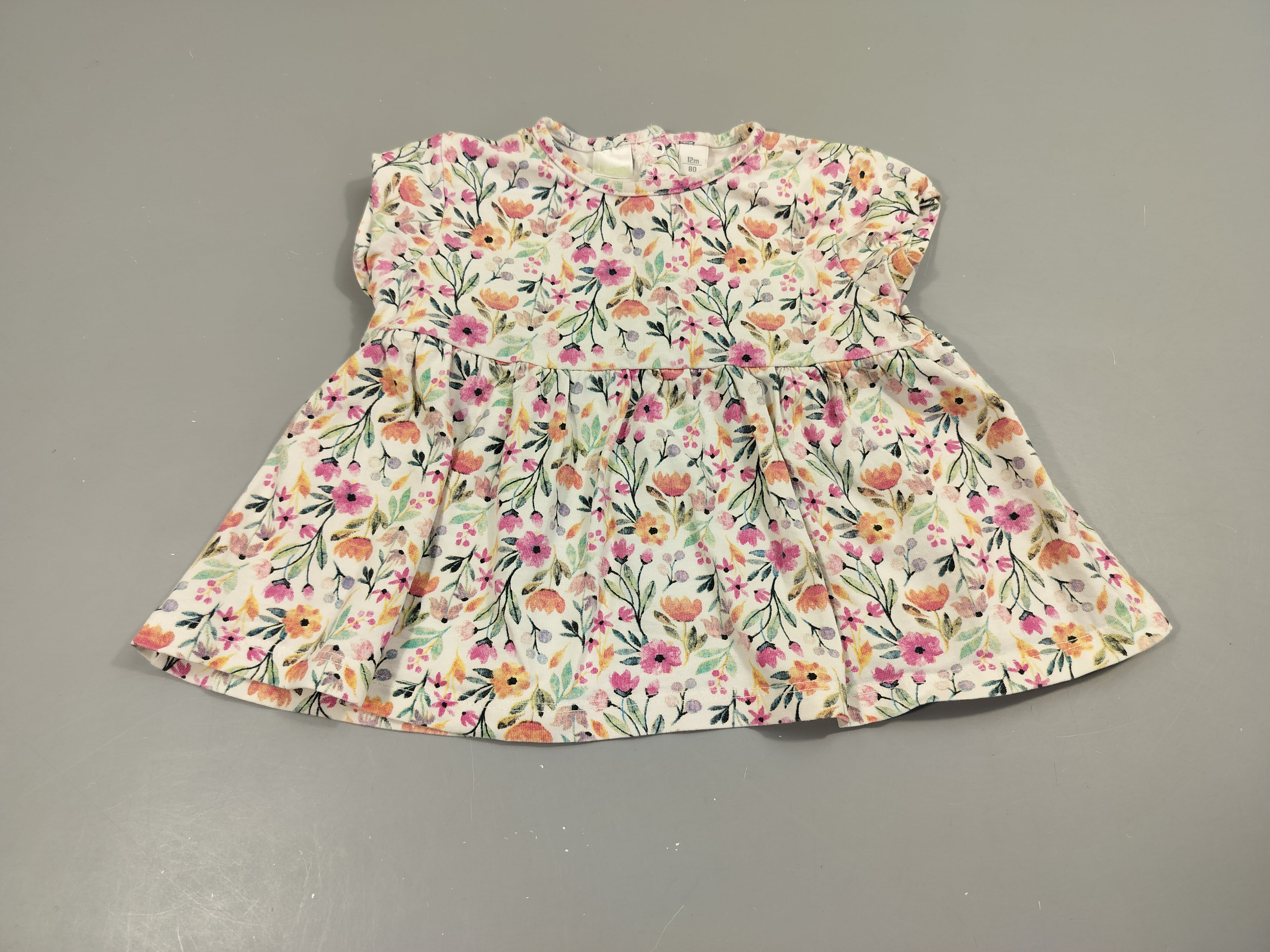 Blouse m.c blanche à fleurs roses, mauves, oranges