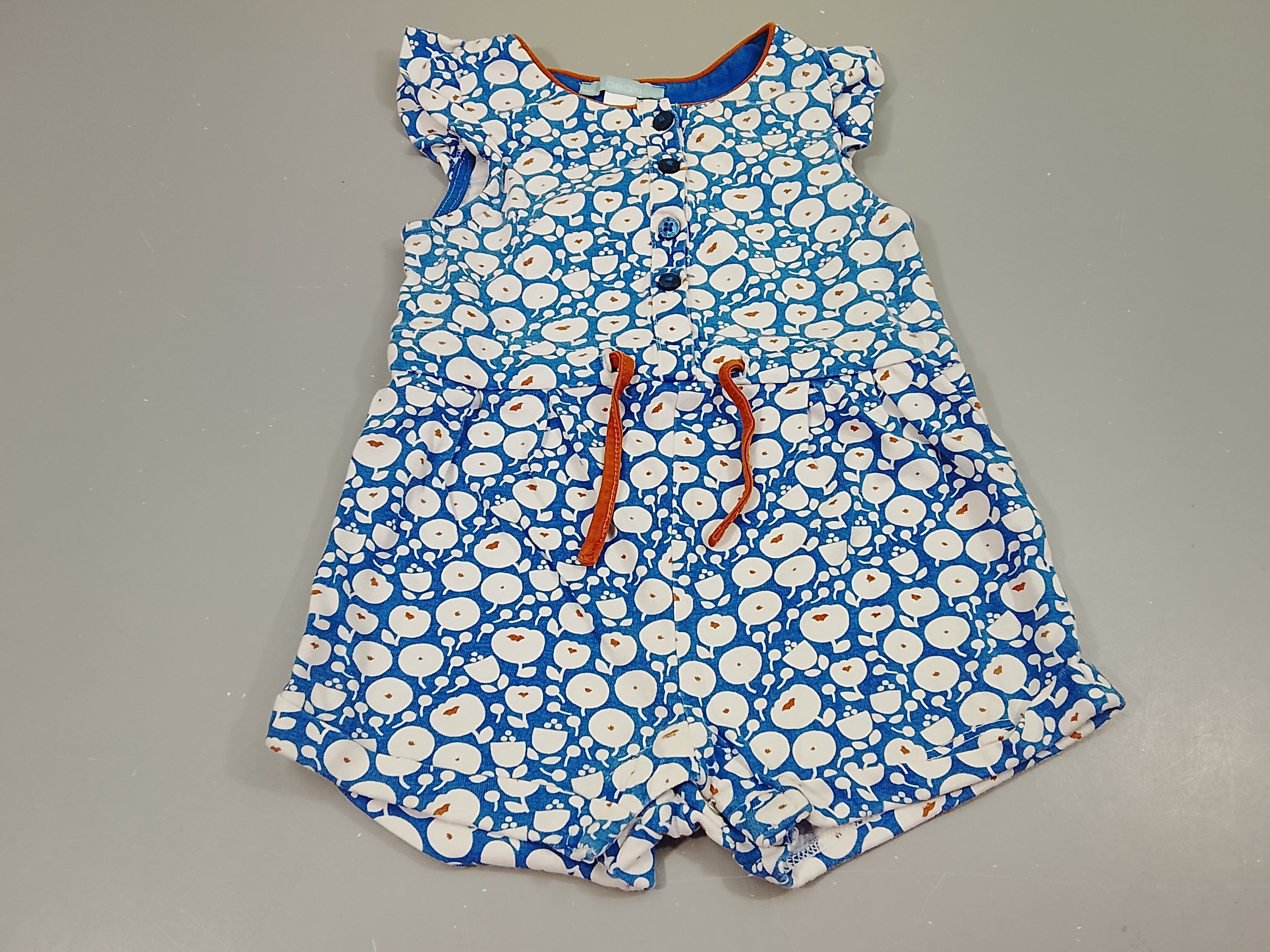 Combishort bleue à fleurs blanches