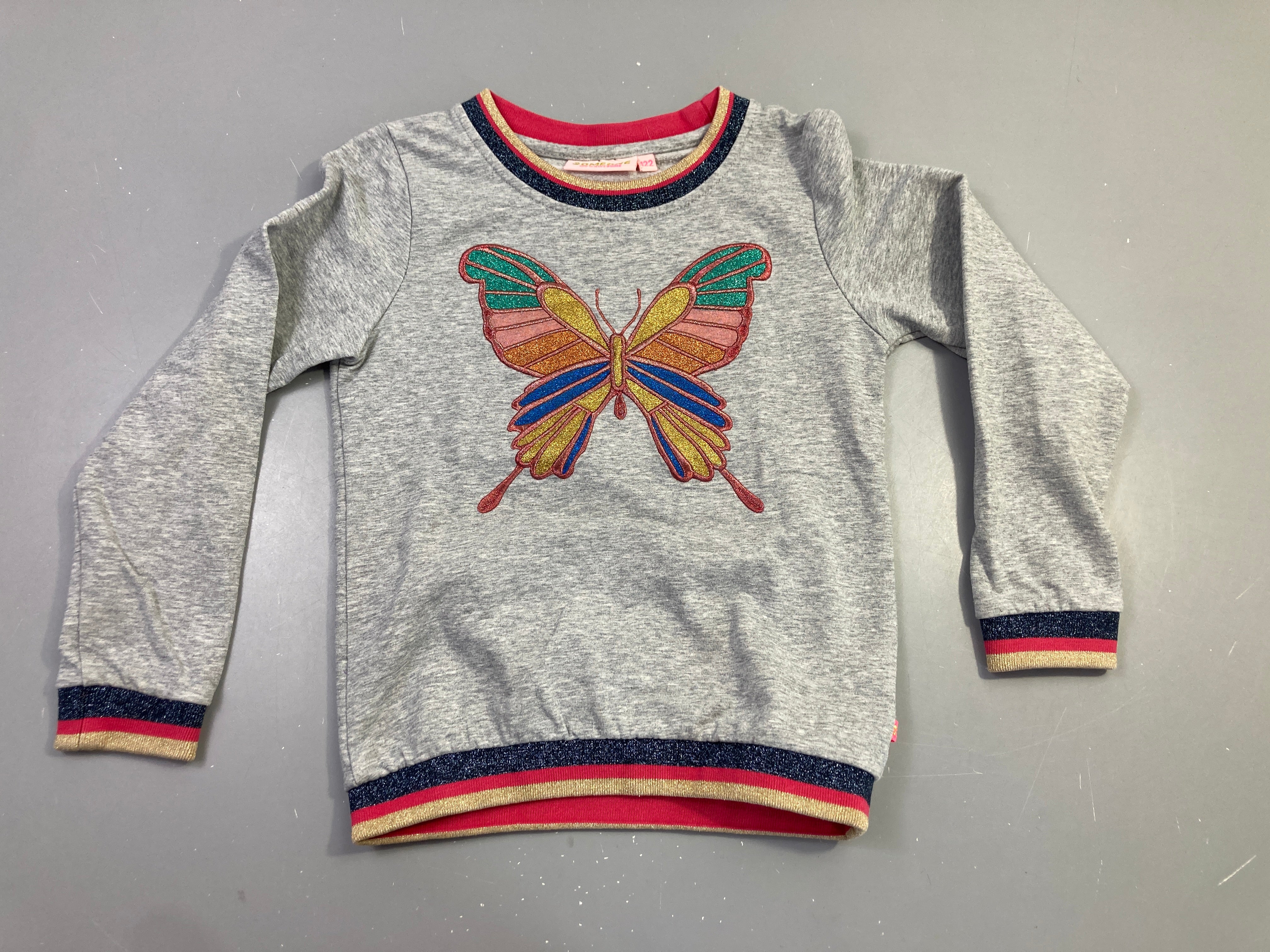 Pull gris papillon pailleté Légèrement bouloché
