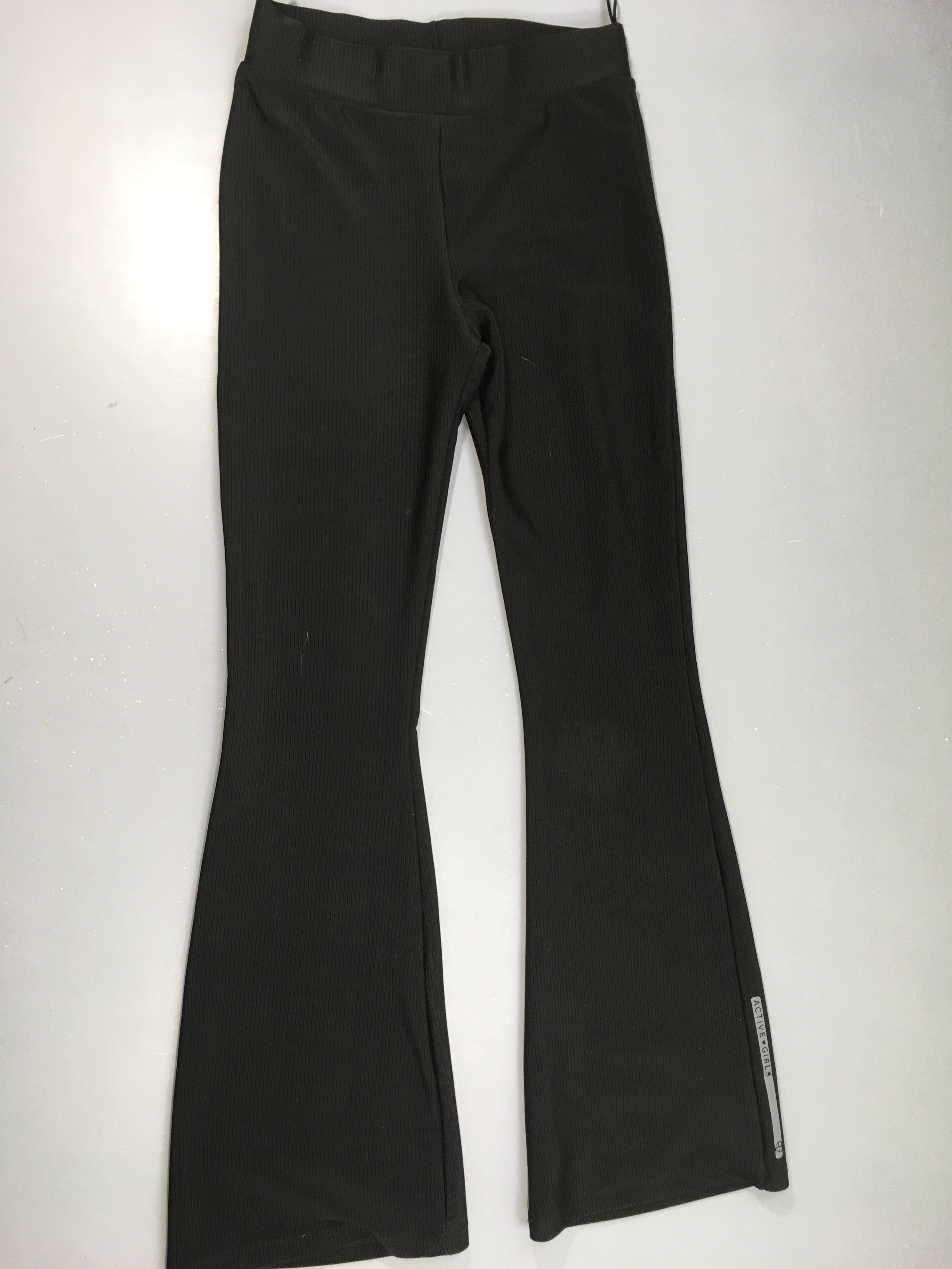 Pantalon noir côtelé évasé active