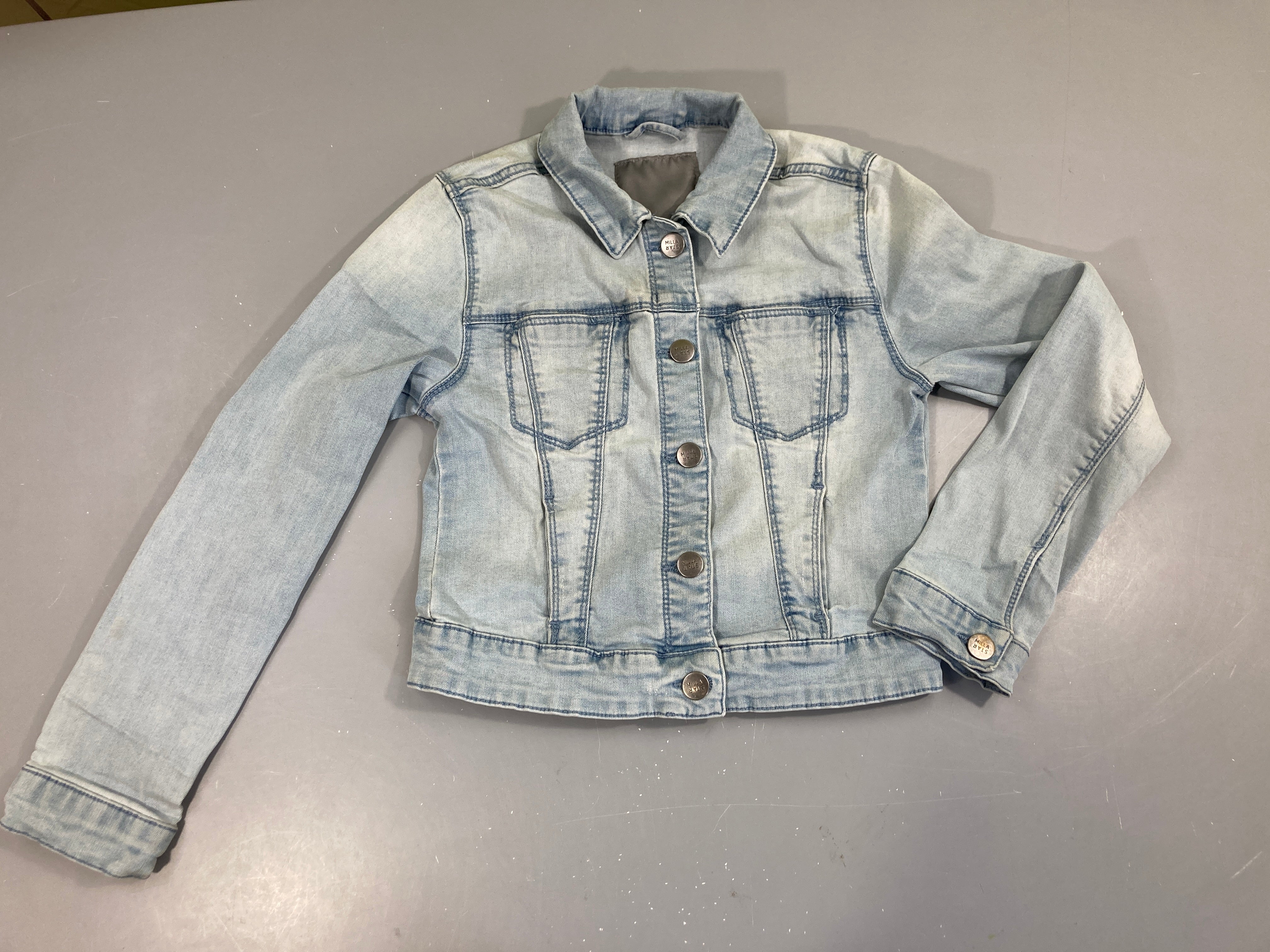 Veste en jean clair effet éraillé Petite tache